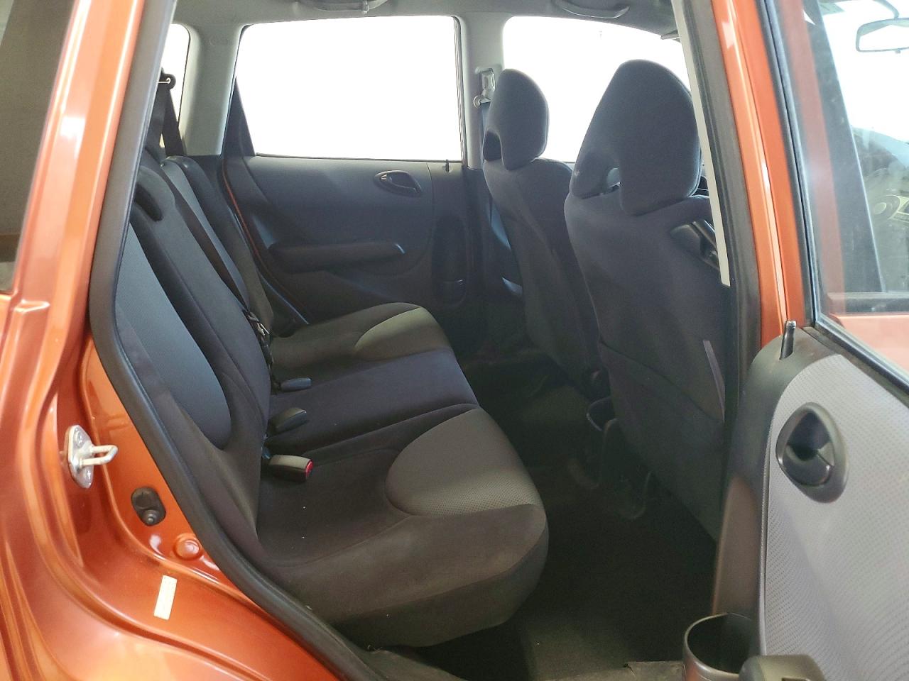 2007 Honda Fit S Orange vin: JHMGD38637S021760
