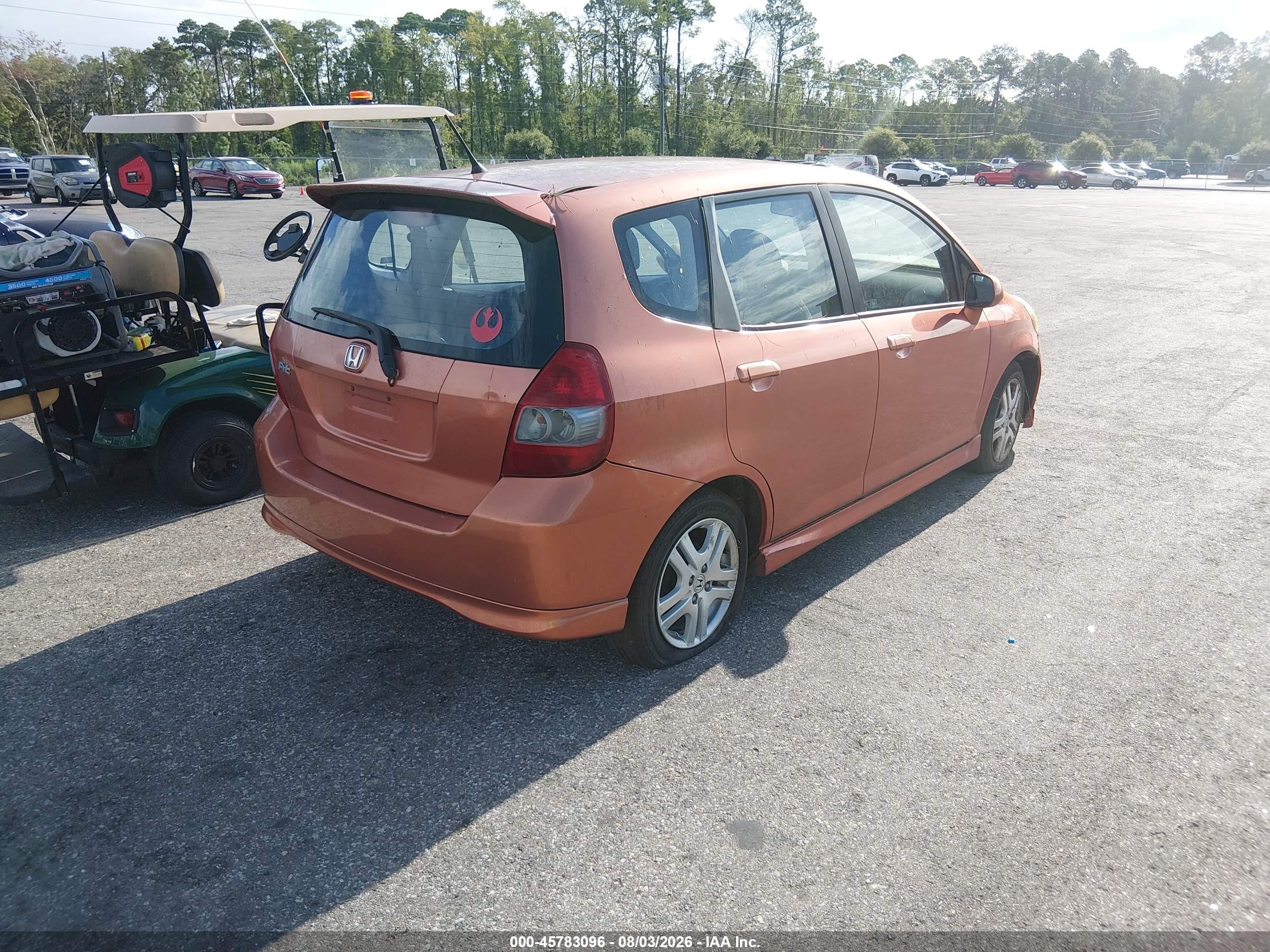 2007 Honda Fit Sport Orange vin: JHMGD38667S036382