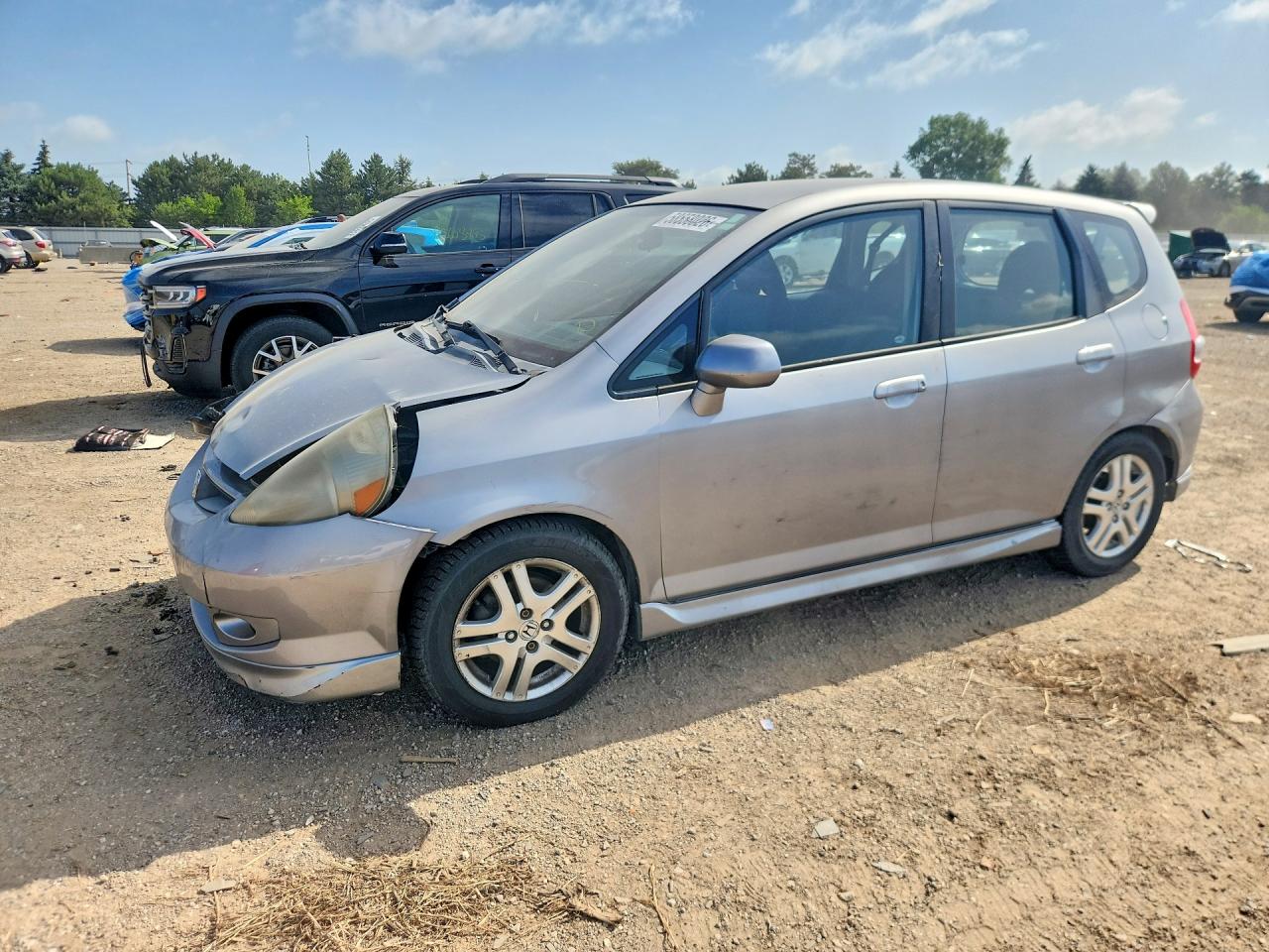 2007 Honda Fit S Silver vin: JHMGD38667S047415