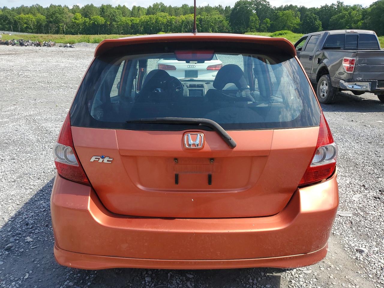 2007 Honda Fit S Orange vin: JHMGD38677S020918