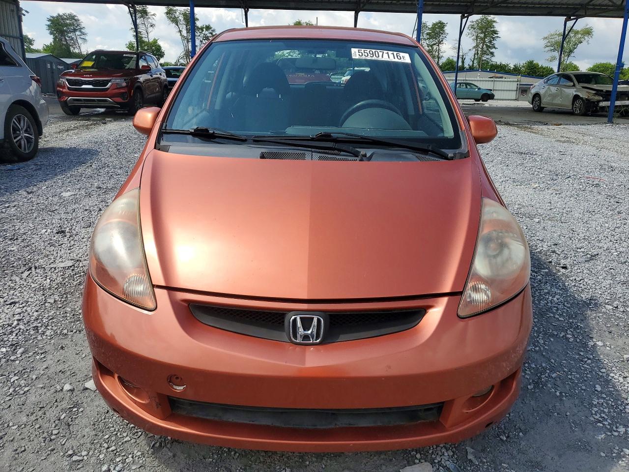 2007 Honda Fit S Orange vin: JHMGD38677S020918