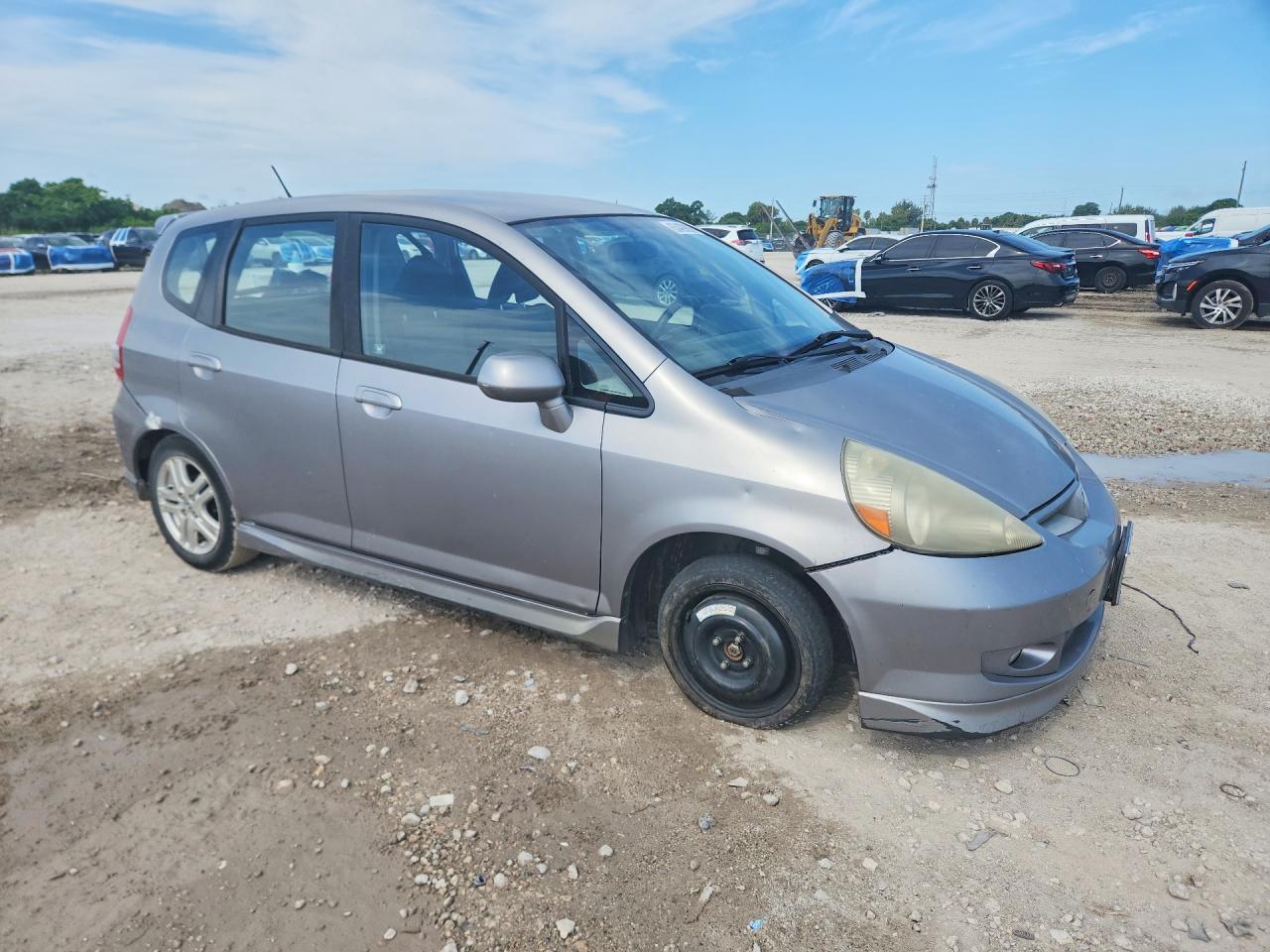 2007 Honda Fit S Silver vin: JHMGD38697S003358