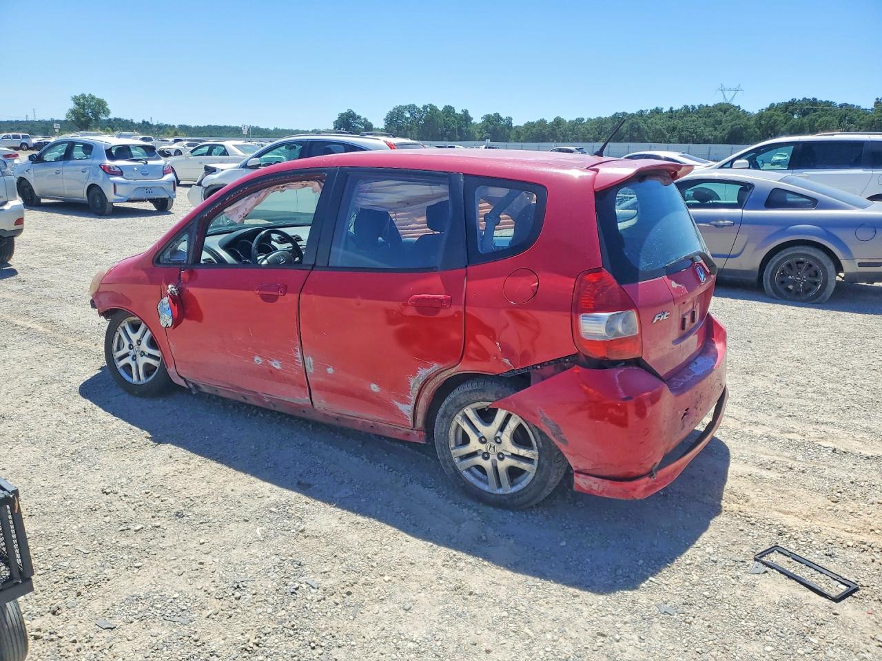 2007 Honda Fit Red vin: JHMGD38697S044007