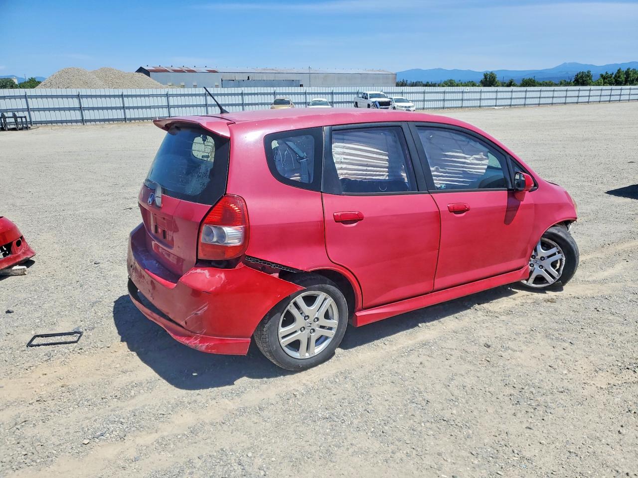 2007 Honda Fit Red vin: JHMGD38697S044007