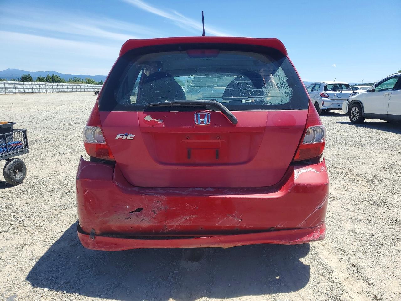2007 Honda Fit Red vin: JHMGD38697S044007