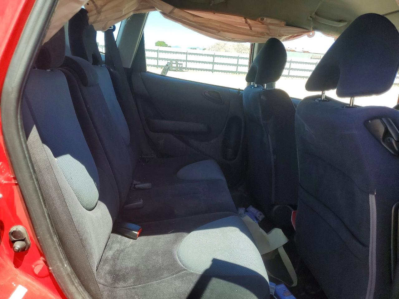 2007 Honda Fit Red vin: JHMGD38697S044007