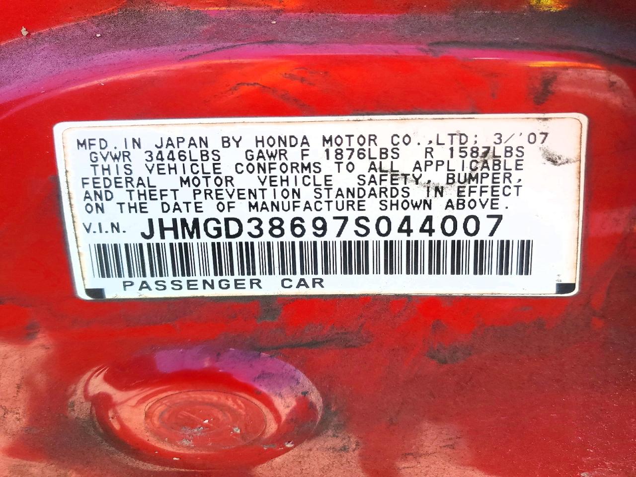 2007 Honda Fit Red vin: JHMGD38697S044007