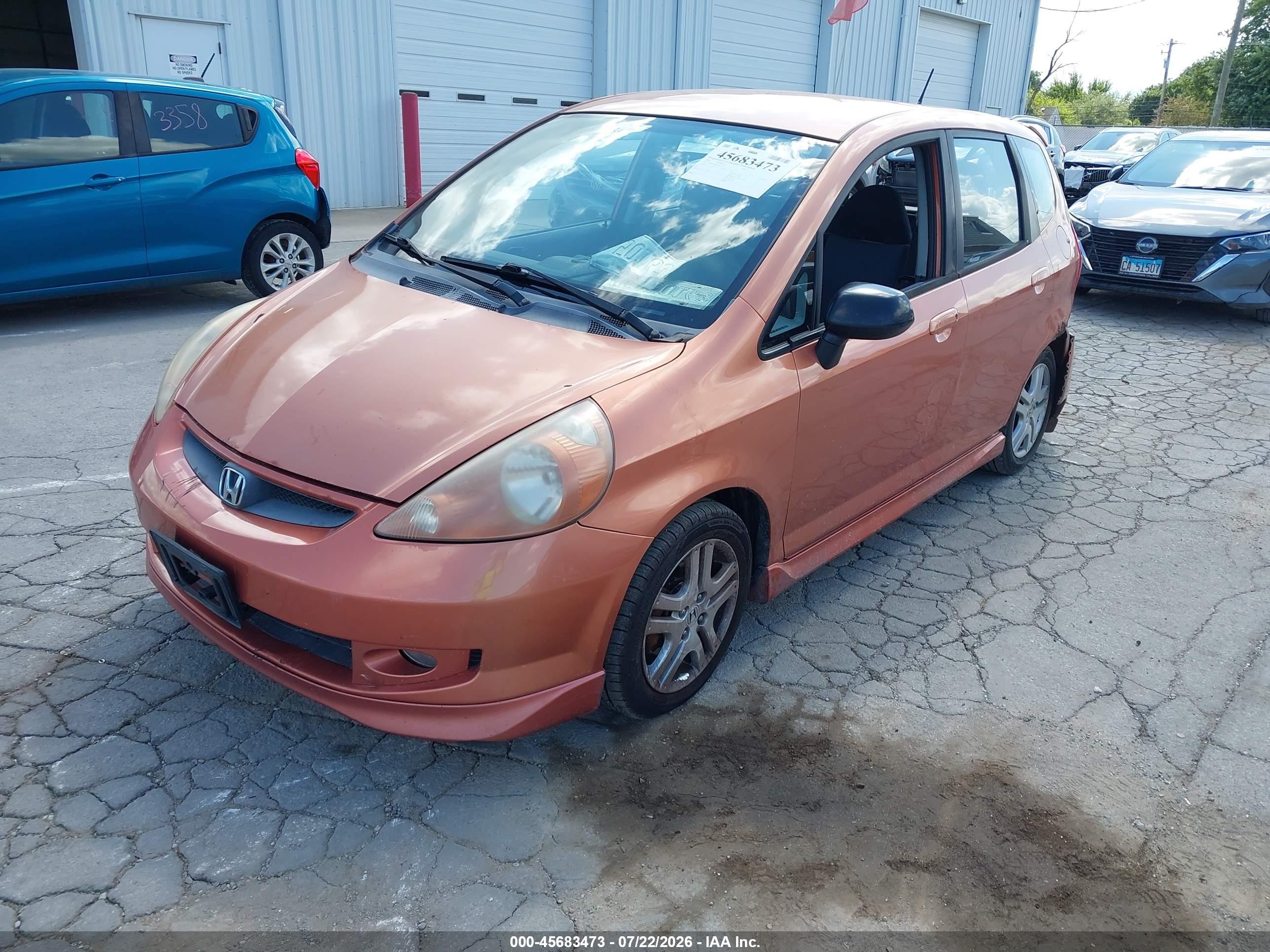 2007 Honda Fit Sport Orange vin: JHMGD38697S063320