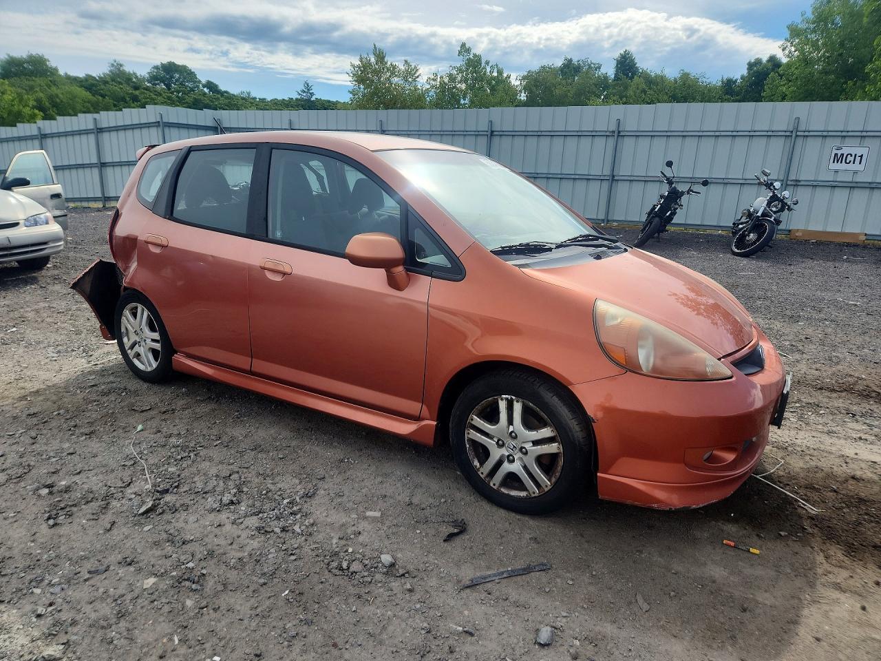 2007 Honda Fit Orange vin: JHMGD386X7S027202