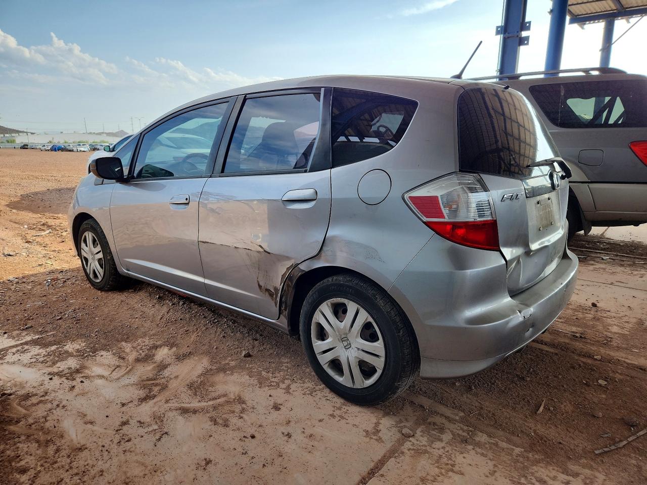 2009 Honda Fit Silver vin: JHMGE87209S048006