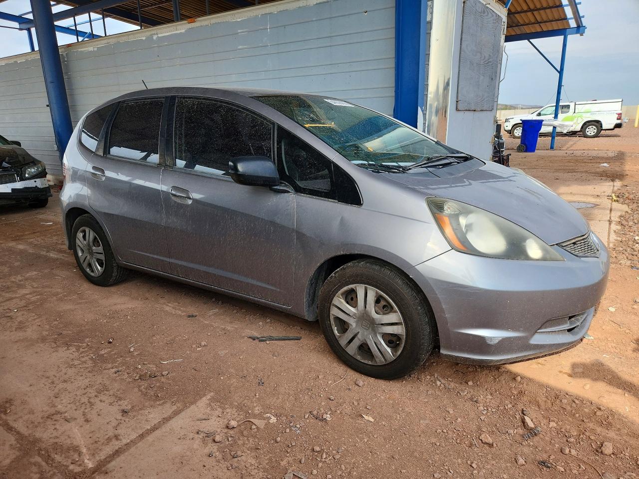 2009 Honda Fit Silver vin: JHMGE87209S048006