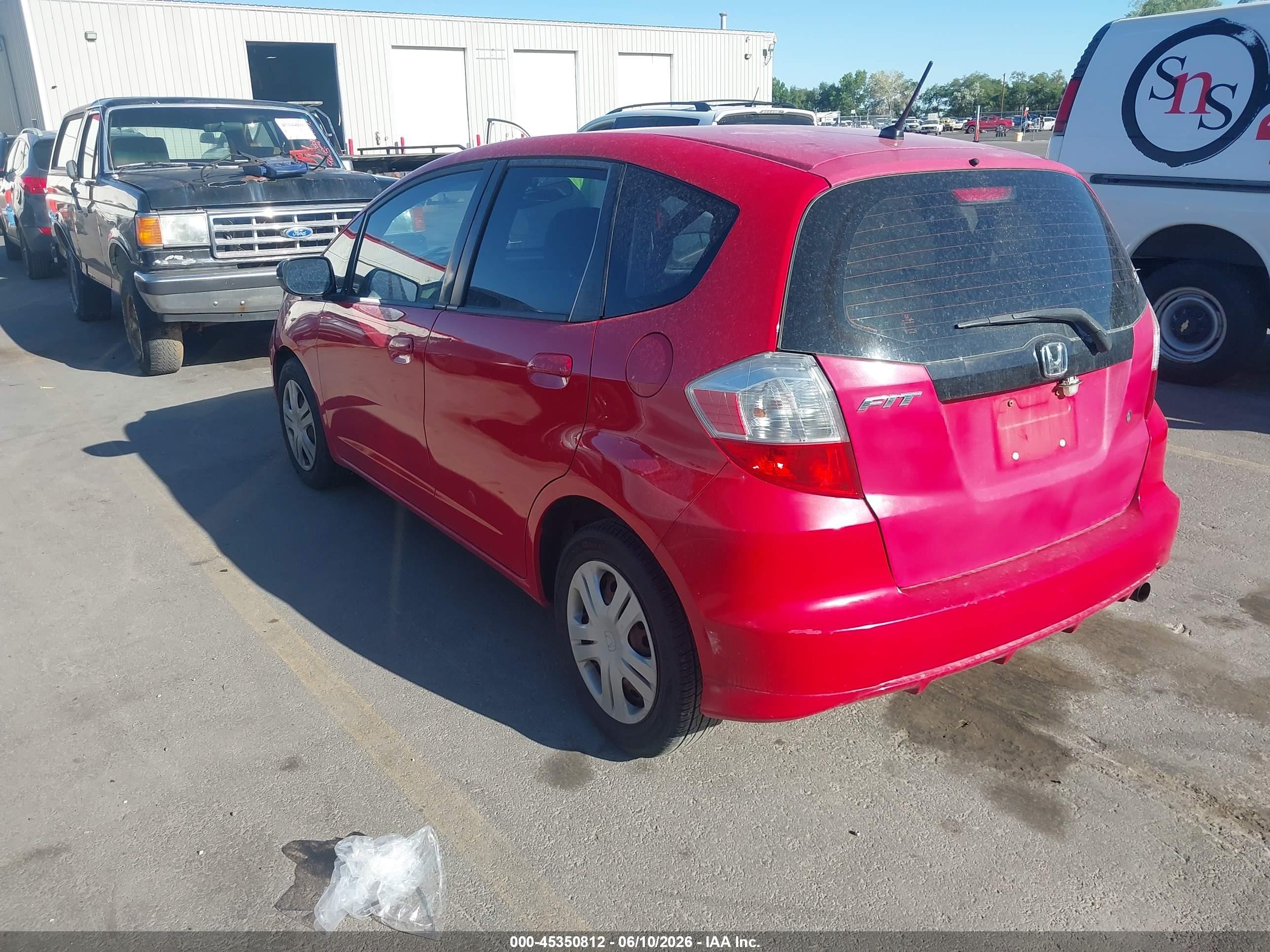 2009 Honda Fit   Red vin: JHMGE87239S041275