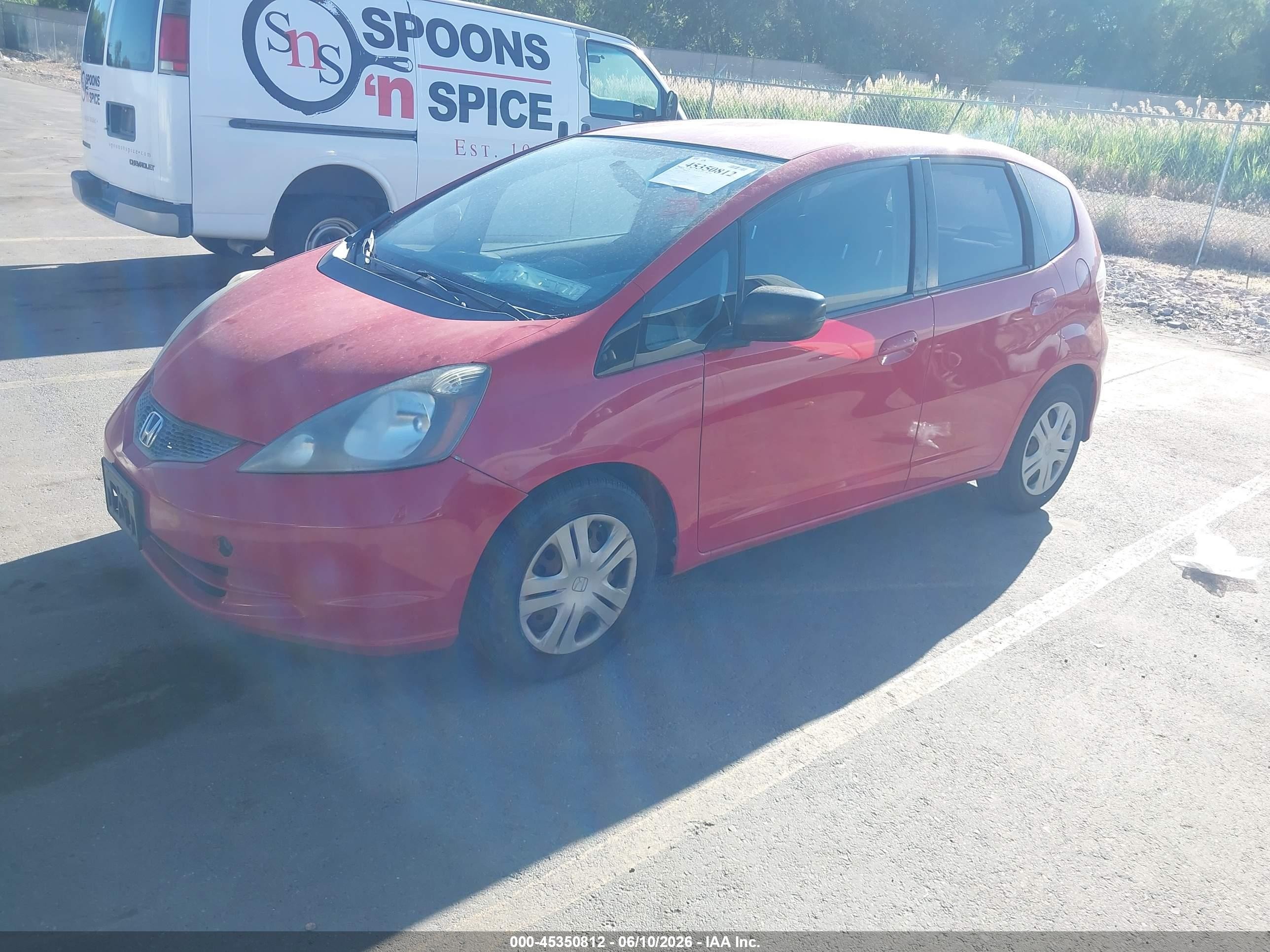 2009 Honda Fit   Red vin: JHMGE87239S041275