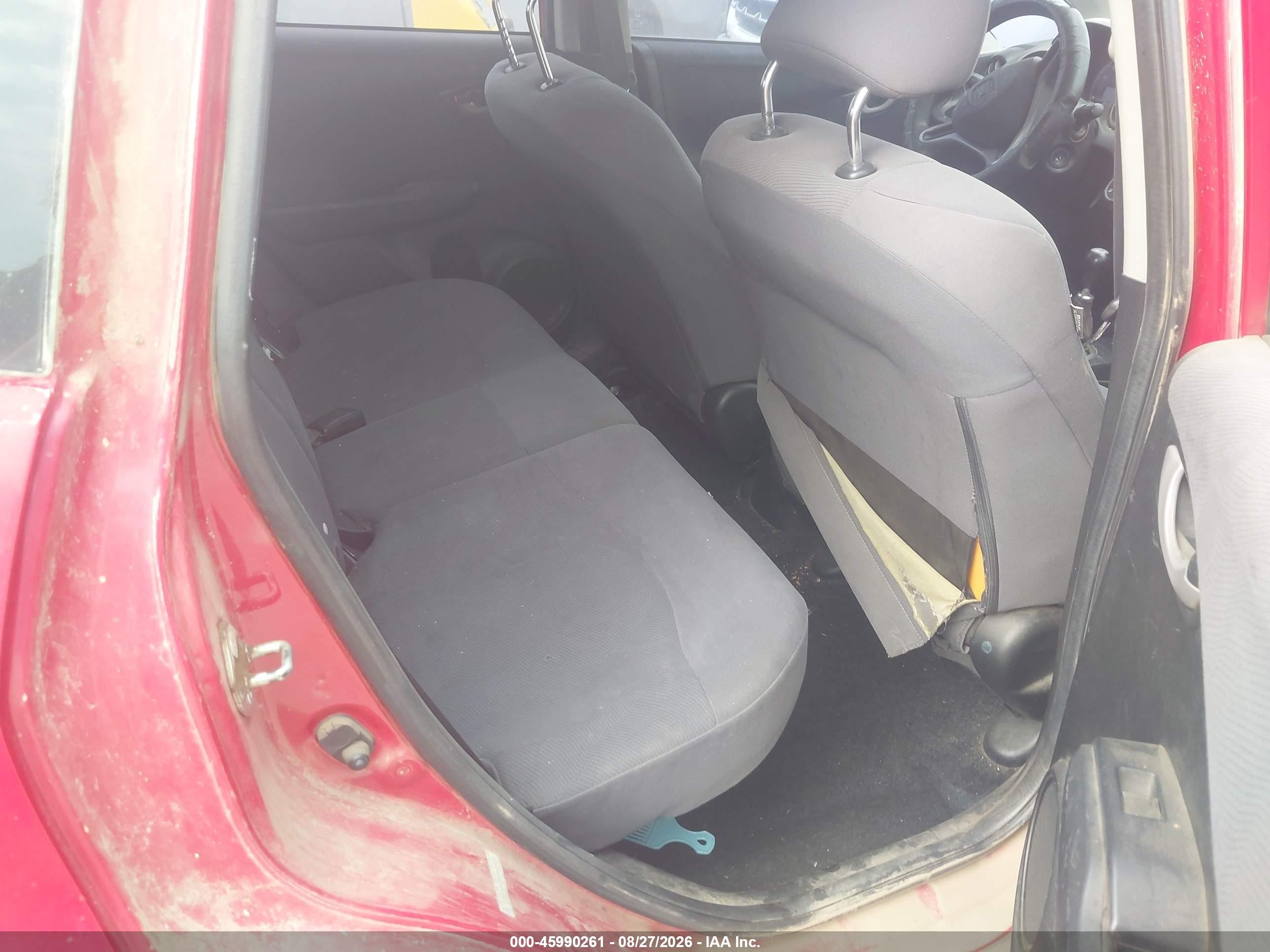 2009 Honda Fit   Red vin: JHMGE87299S009429