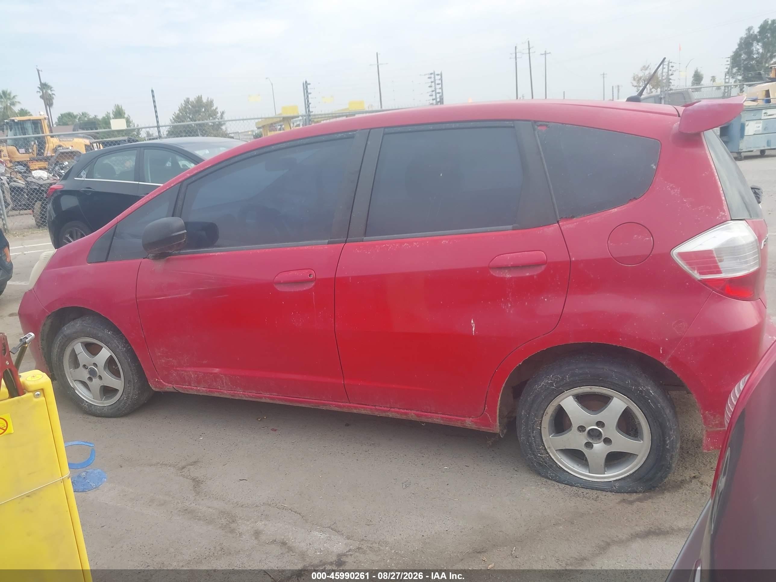 2009 Honda Fit   Red vin: JHMGE87299S009429