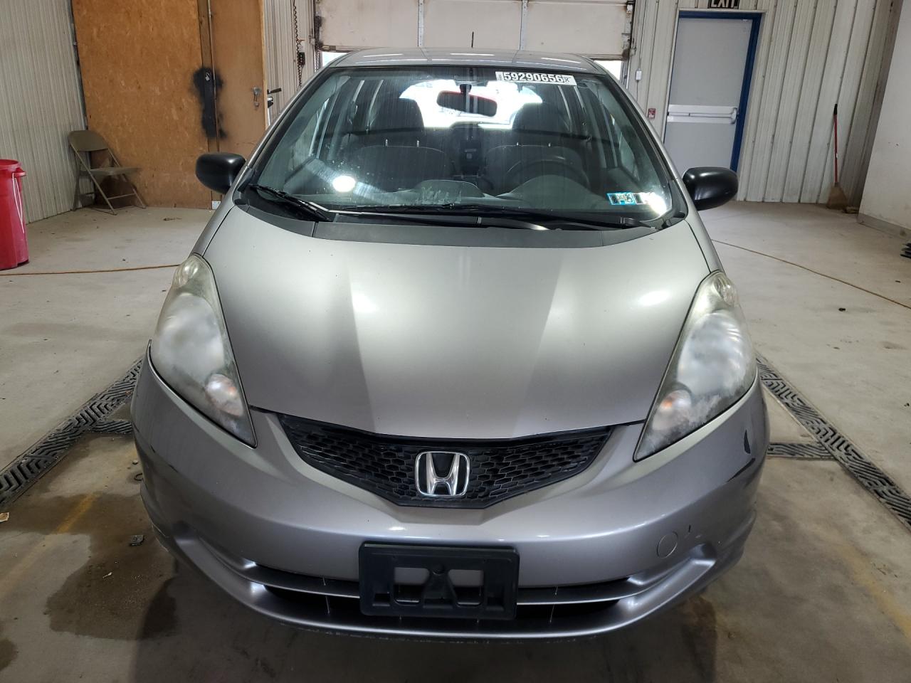 2009 Honda Fit Silver vin: JHMGE872X9S038132 Damage: Left Head Lamp, Faded, Repair Required
