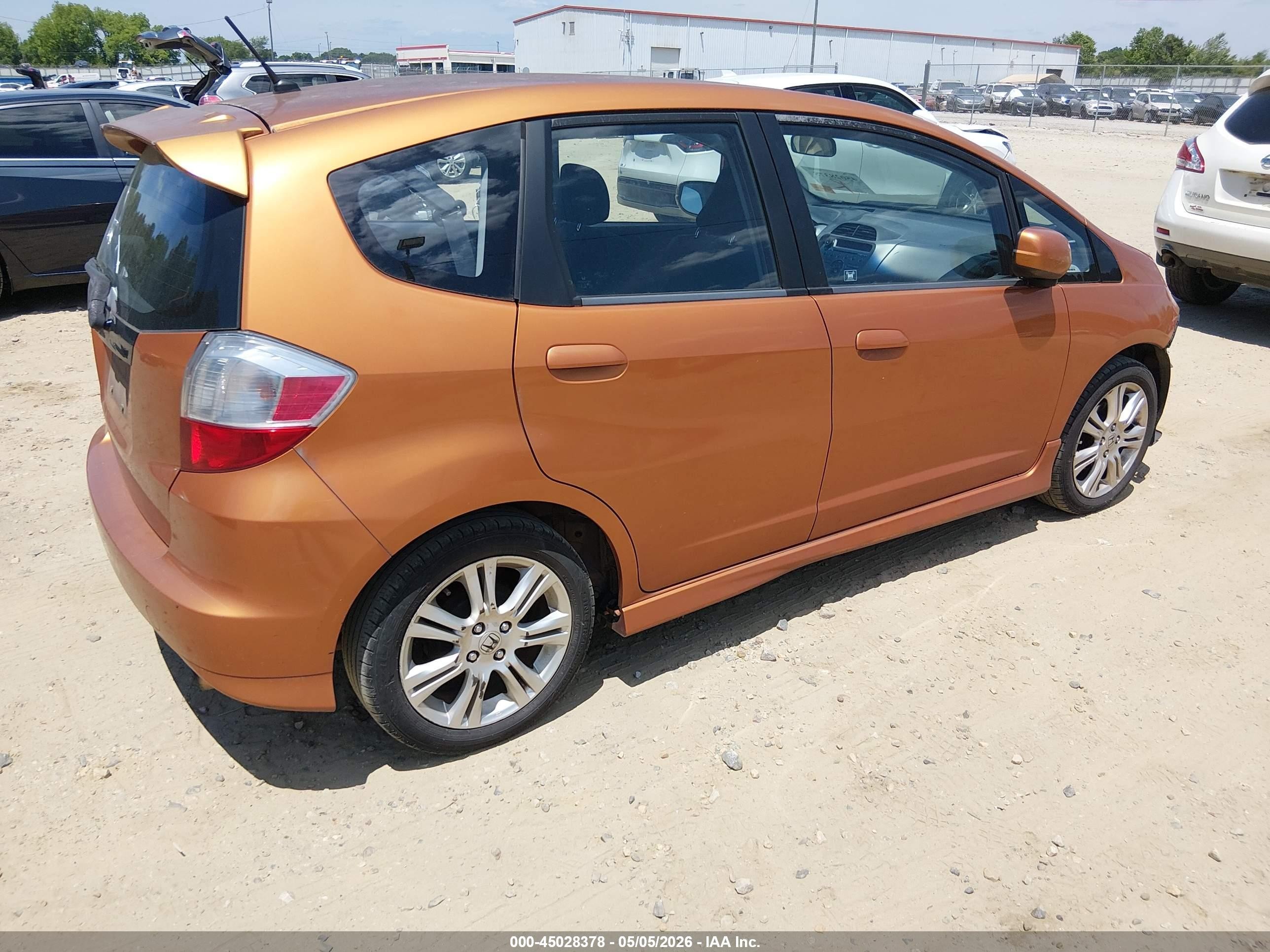 2009 Honda Fit Sport Orange vin: JHMGE87429S072485