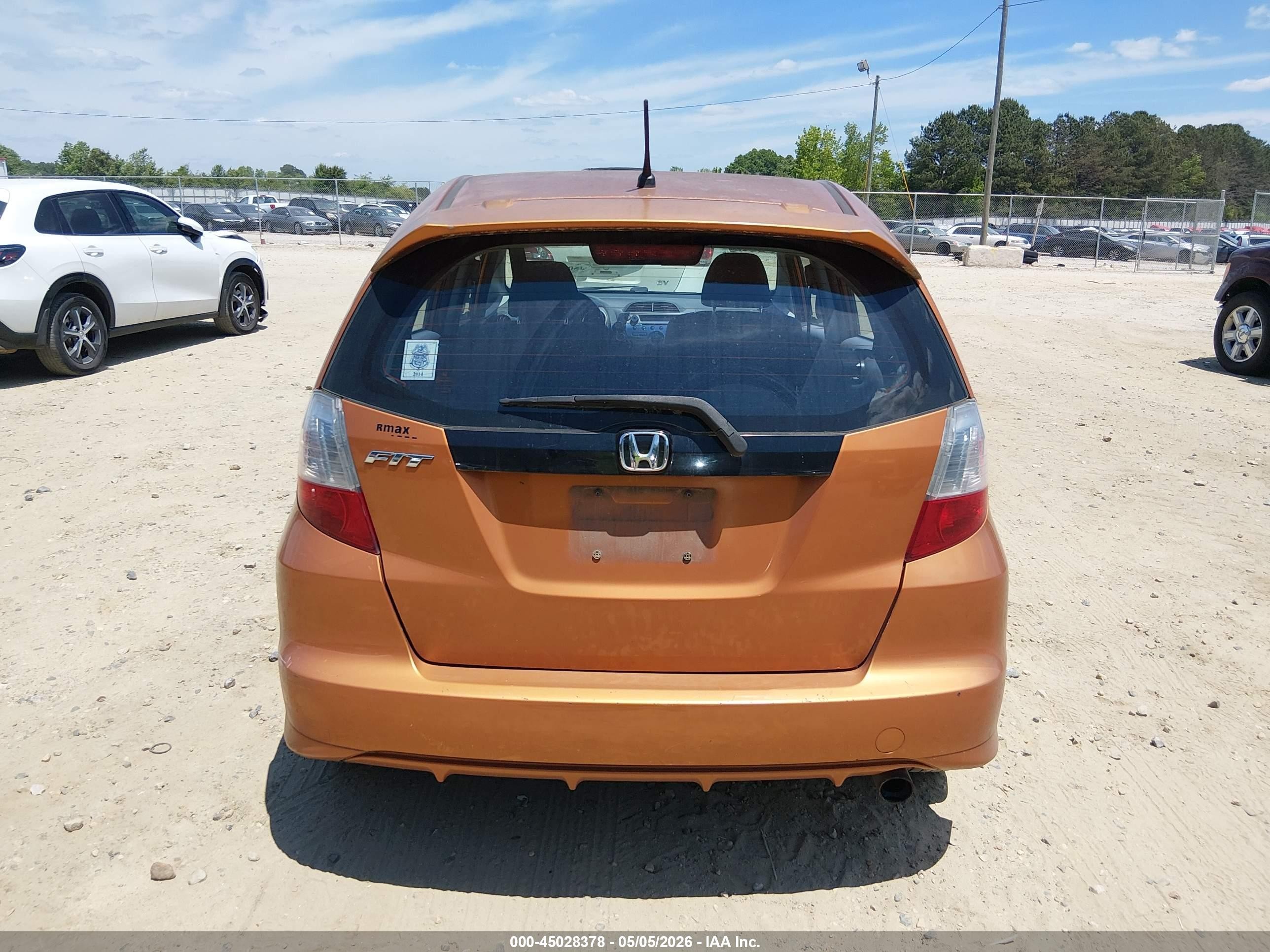 2009 Honda Fit Sport Orange vin: JHMGE87429S072485
