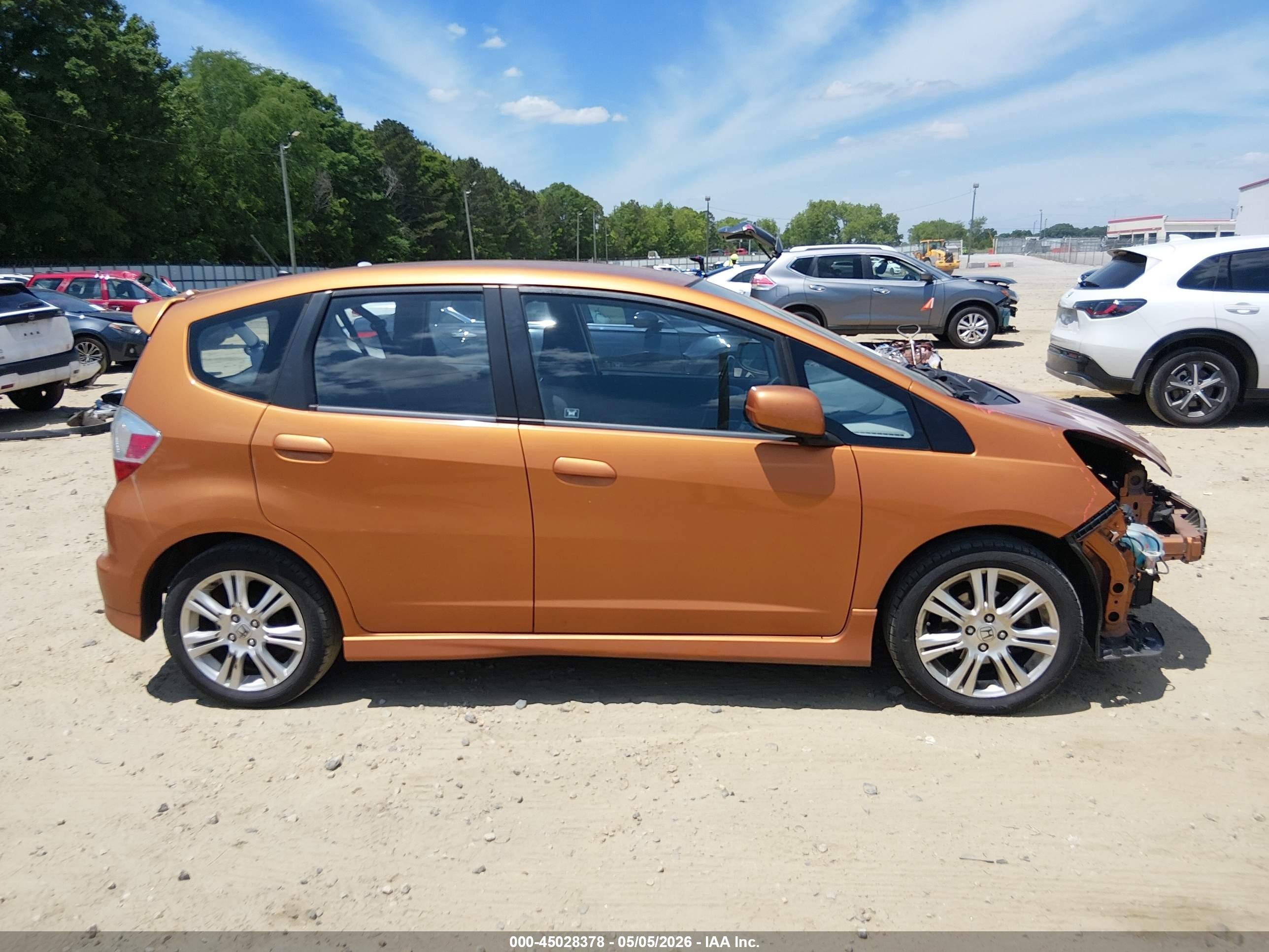 2009 Honda Fit Sport Orange vin: JHMGE87429S072485