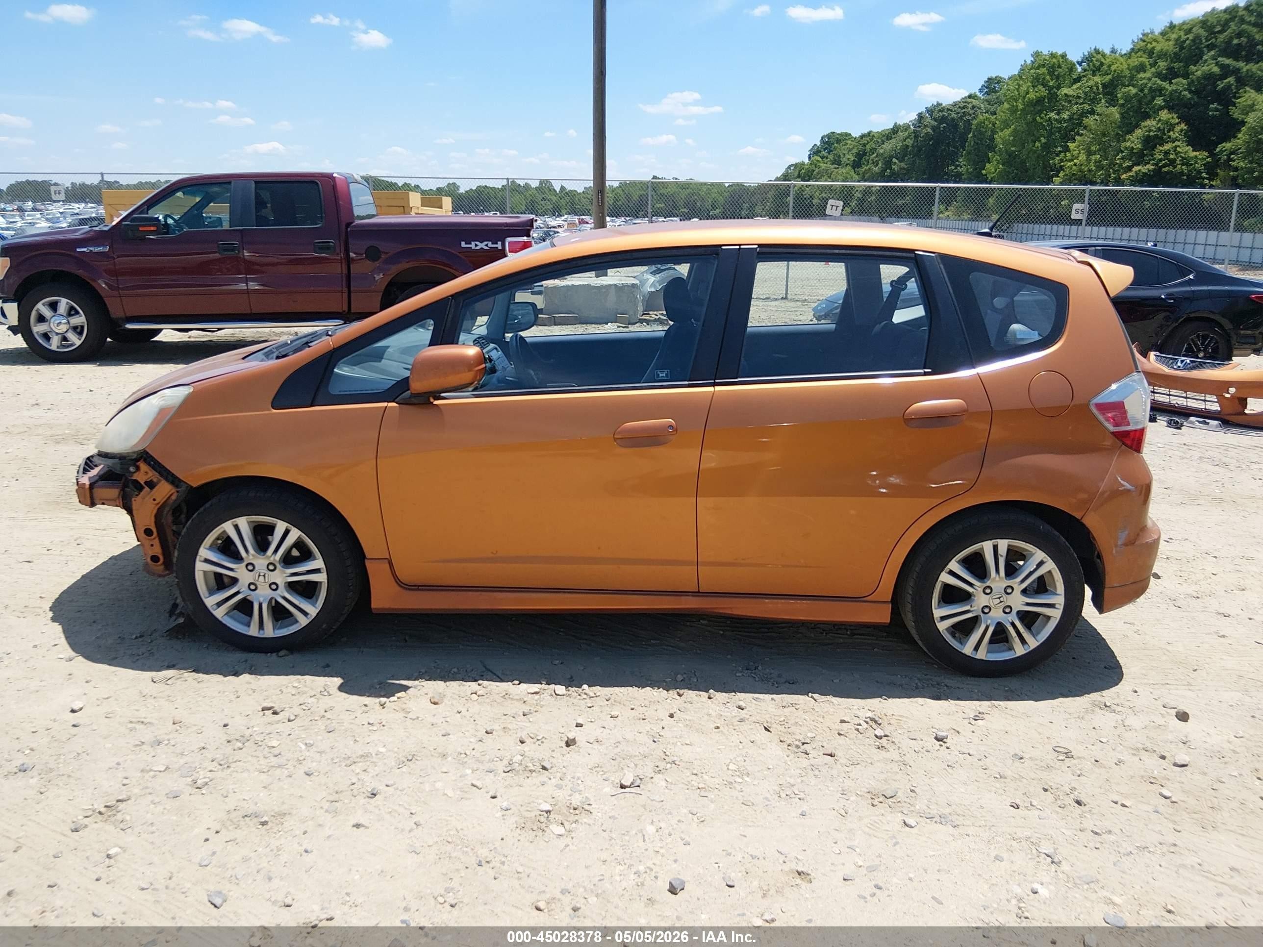 2009 Honda Fit Sport Orange vin: JHMGE87429S072485