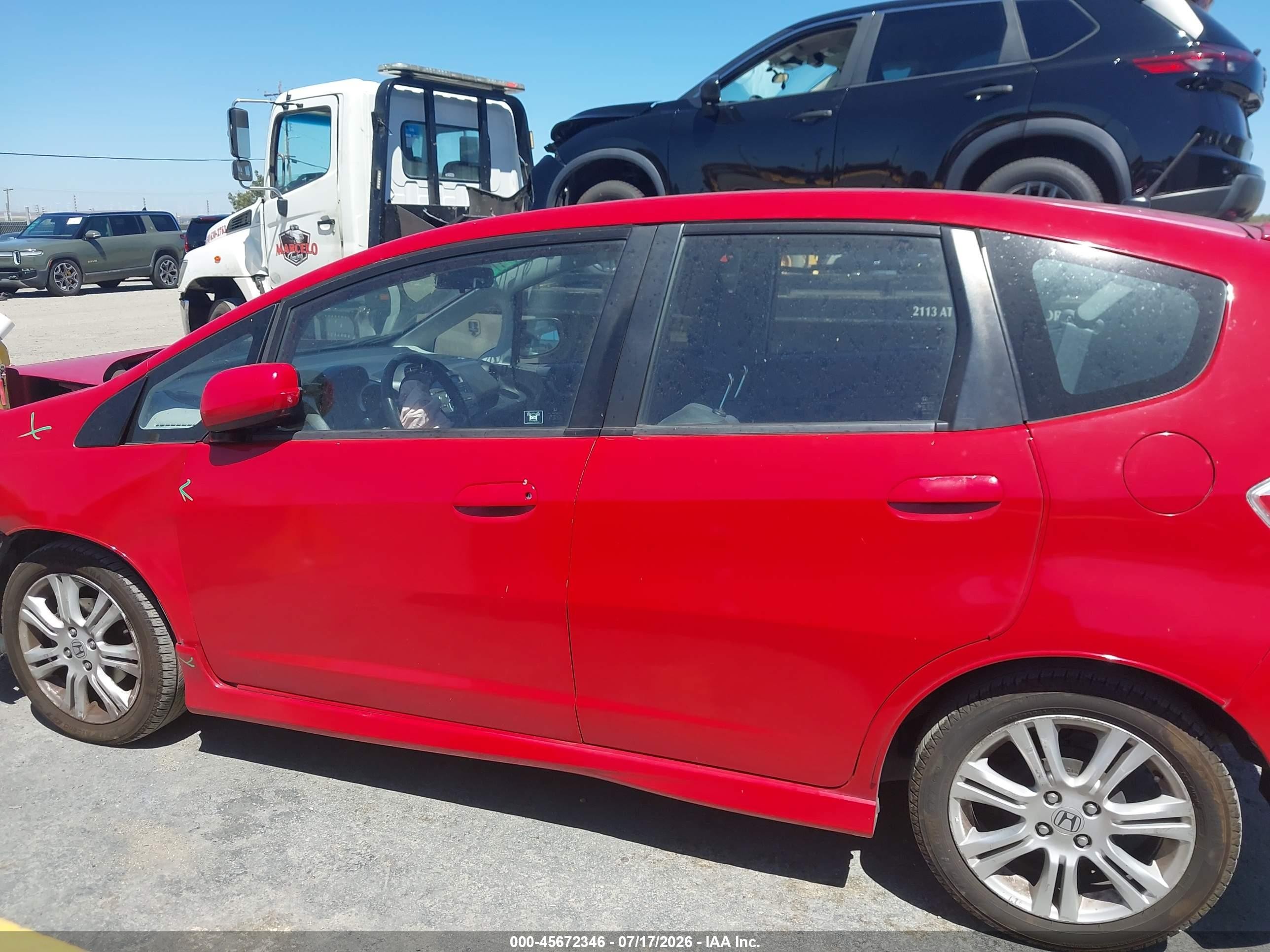 2009 Honda Fit Sport Red vin: JHMGE87449S004494