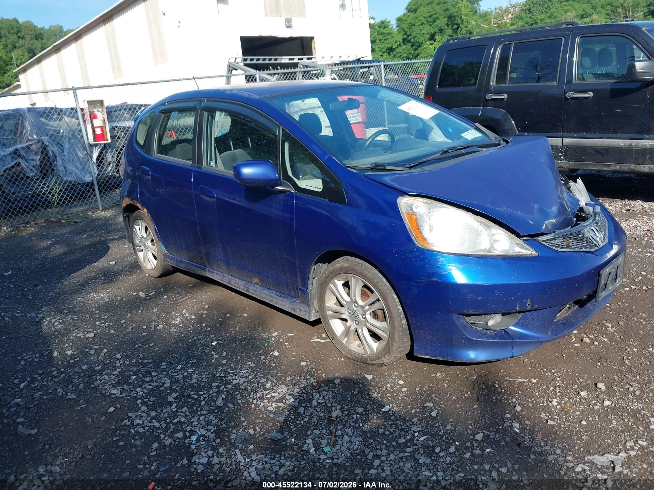 2009 Honda Fit Sport Blue vin: JHMGE87469S056192