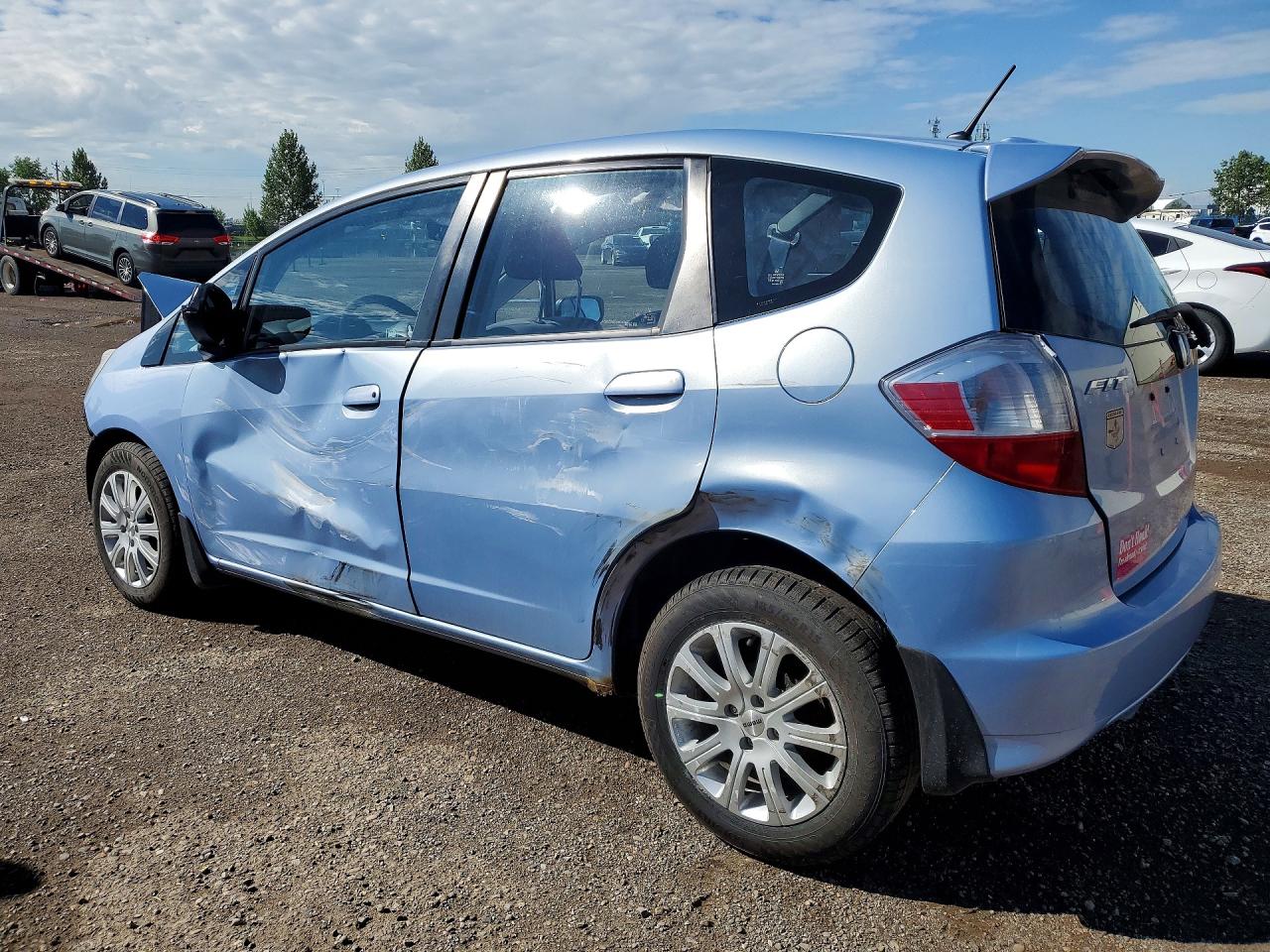 2009 Honda Fit Lx Blue vin: JHMGE87509S805495
