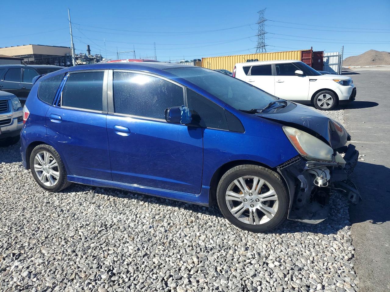 2009 Honda Fit Sport Blue vin: JHMGE876X9S007529