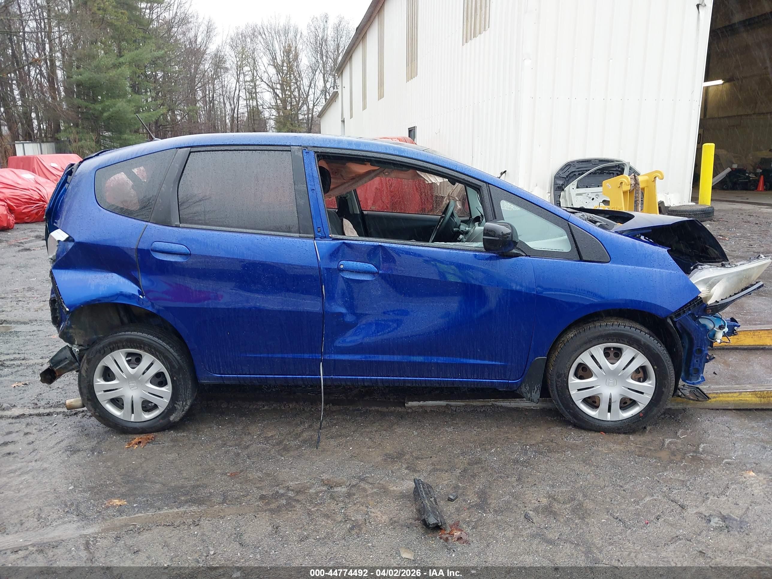 2009 Honda Fit   Blue vin: JHMGE88219S003123