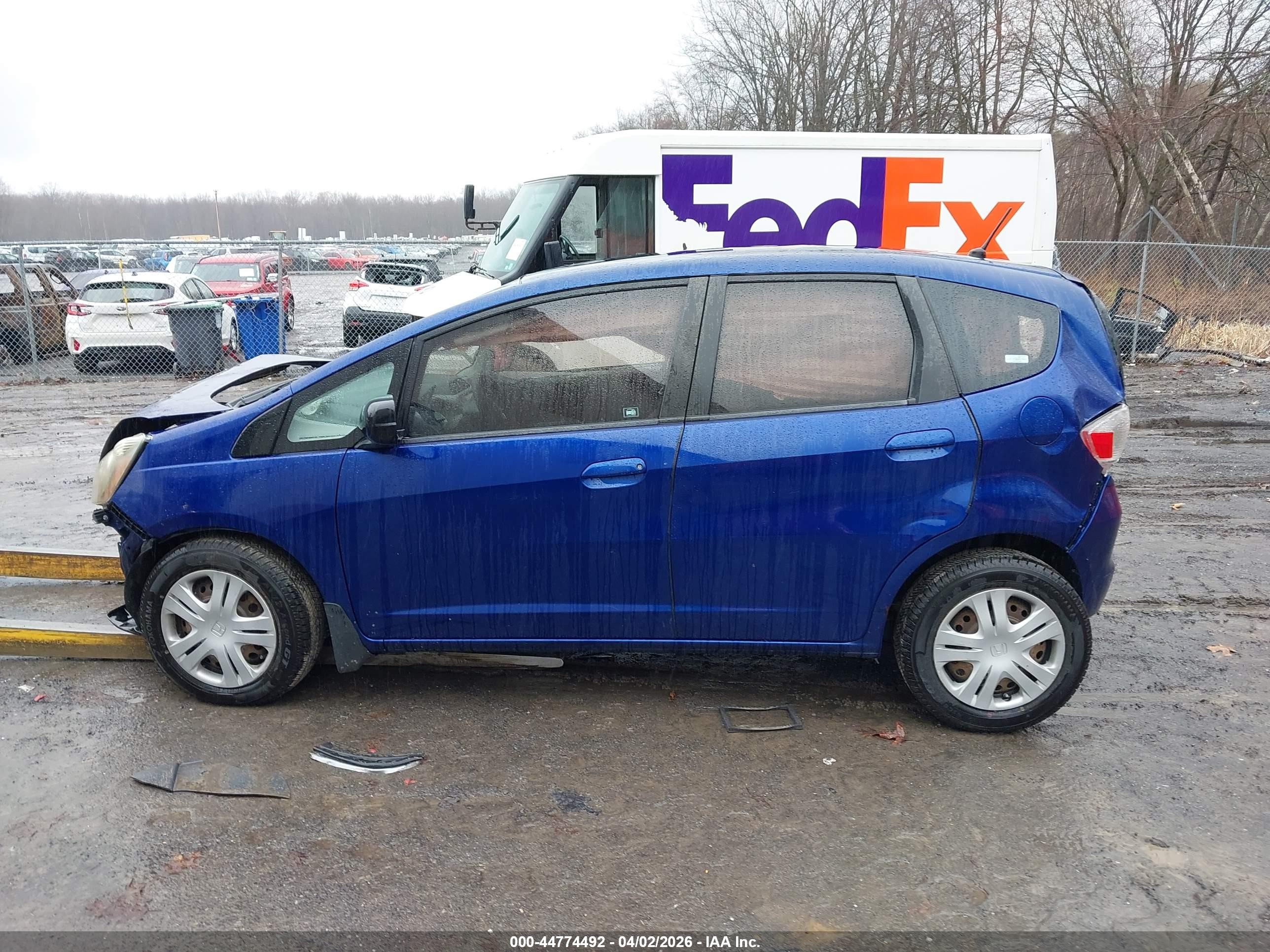 2009 Honda Fit   Blue vin: JHMGE88219S003123