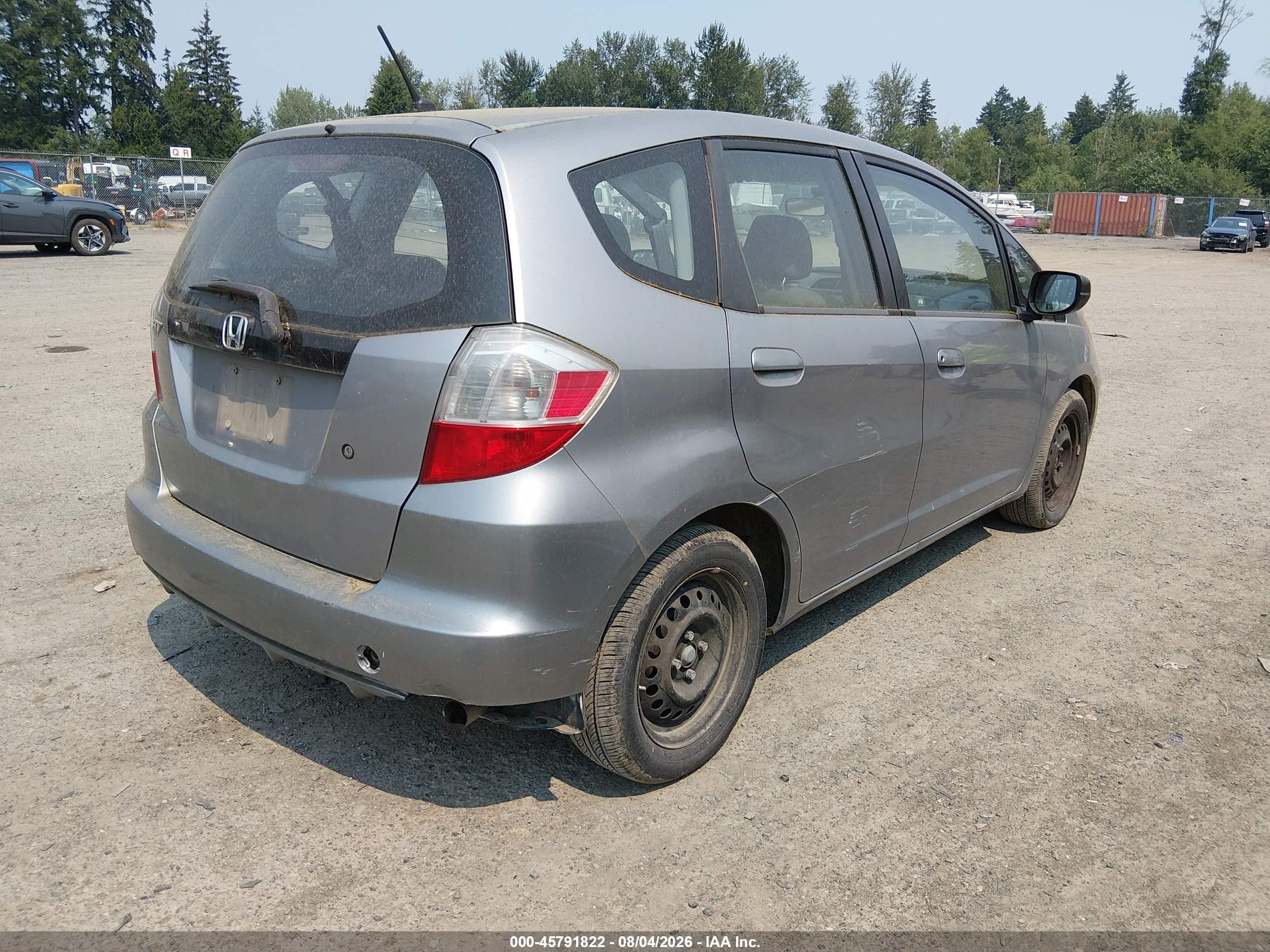 2009 Honda Fit   Gray vin: JHMGE88219S018978