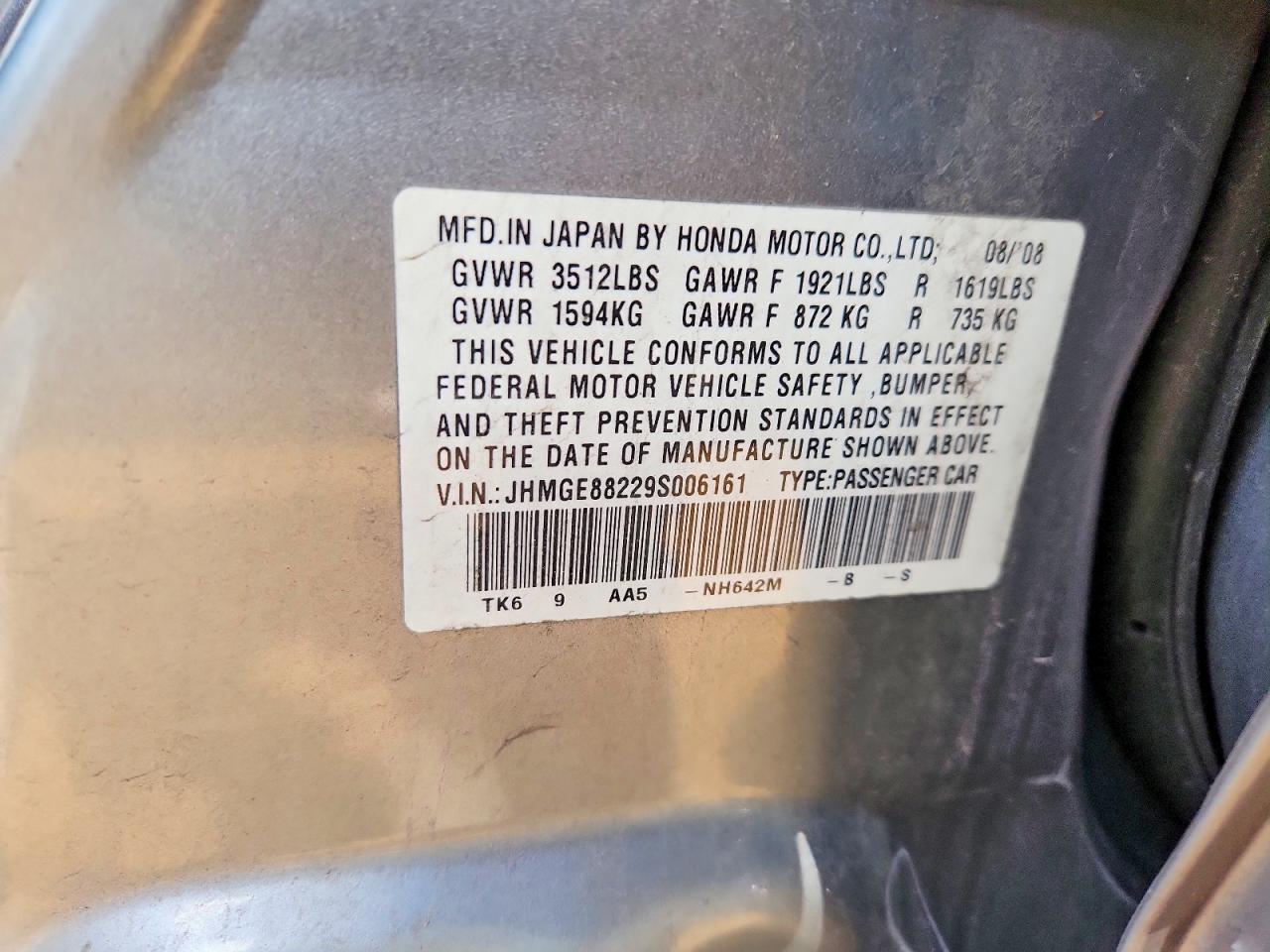2009 Honda Fit Silver vin: JHMGE88229S006161