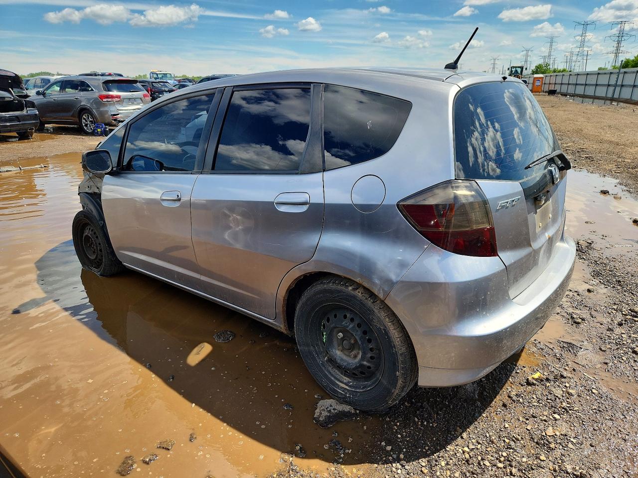 2009 Honda Fit Silver vin: JHMGE88229S006161