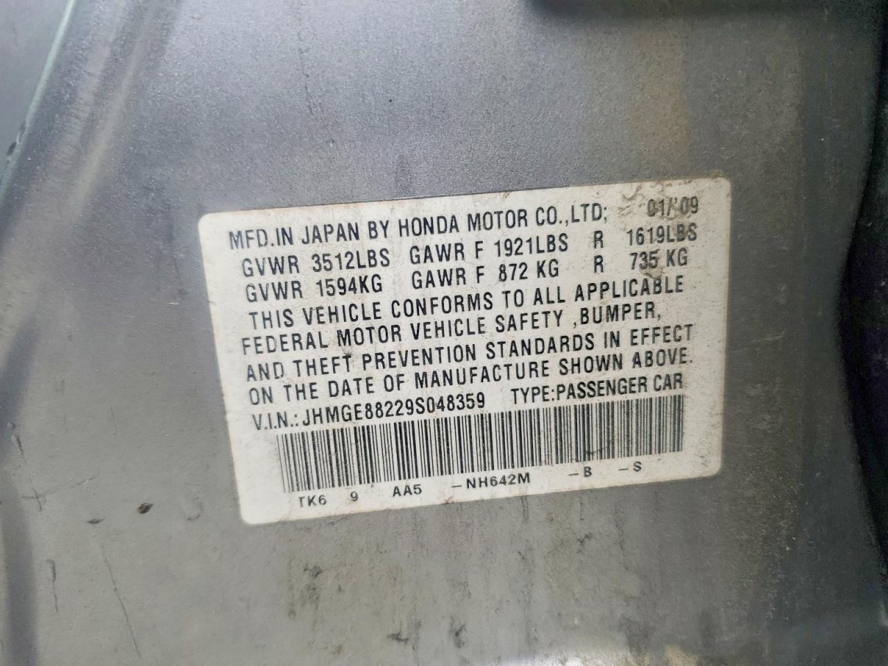 2009 Honda Fit Gray vin: JHMGE88229S048359