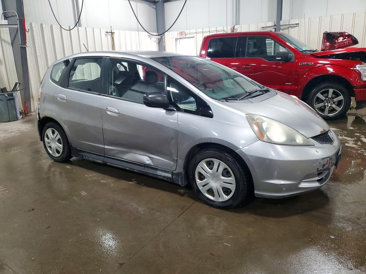 2009 Honda Fit Silver vin: JHMGE88249S008865