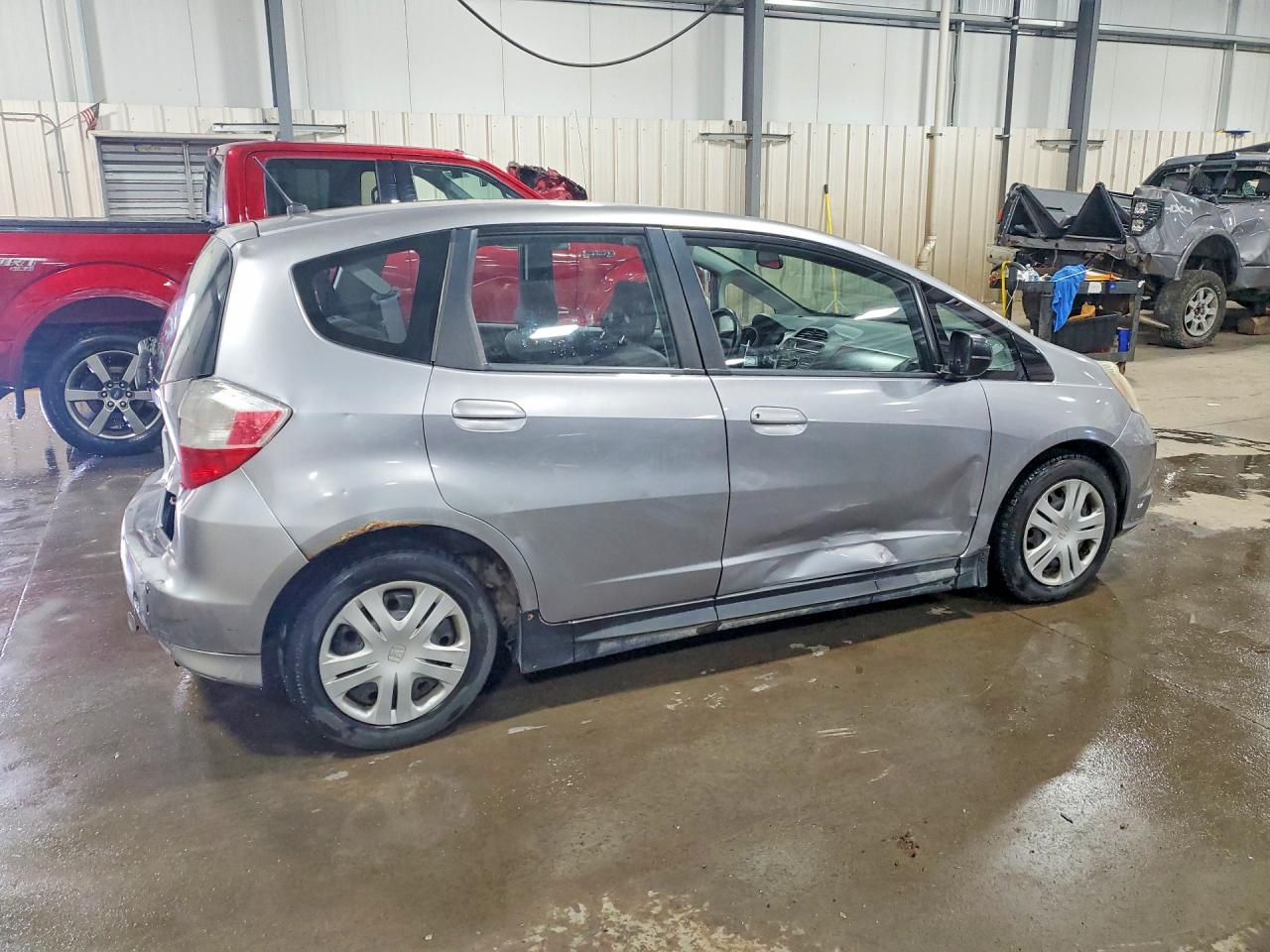 2009 Honda Fit Silver vin: JHMGE88249S008865