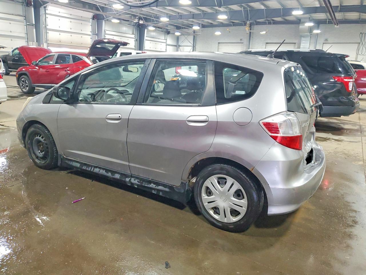 2009 Honda Fit Silver vin: JHMGE88249S008865