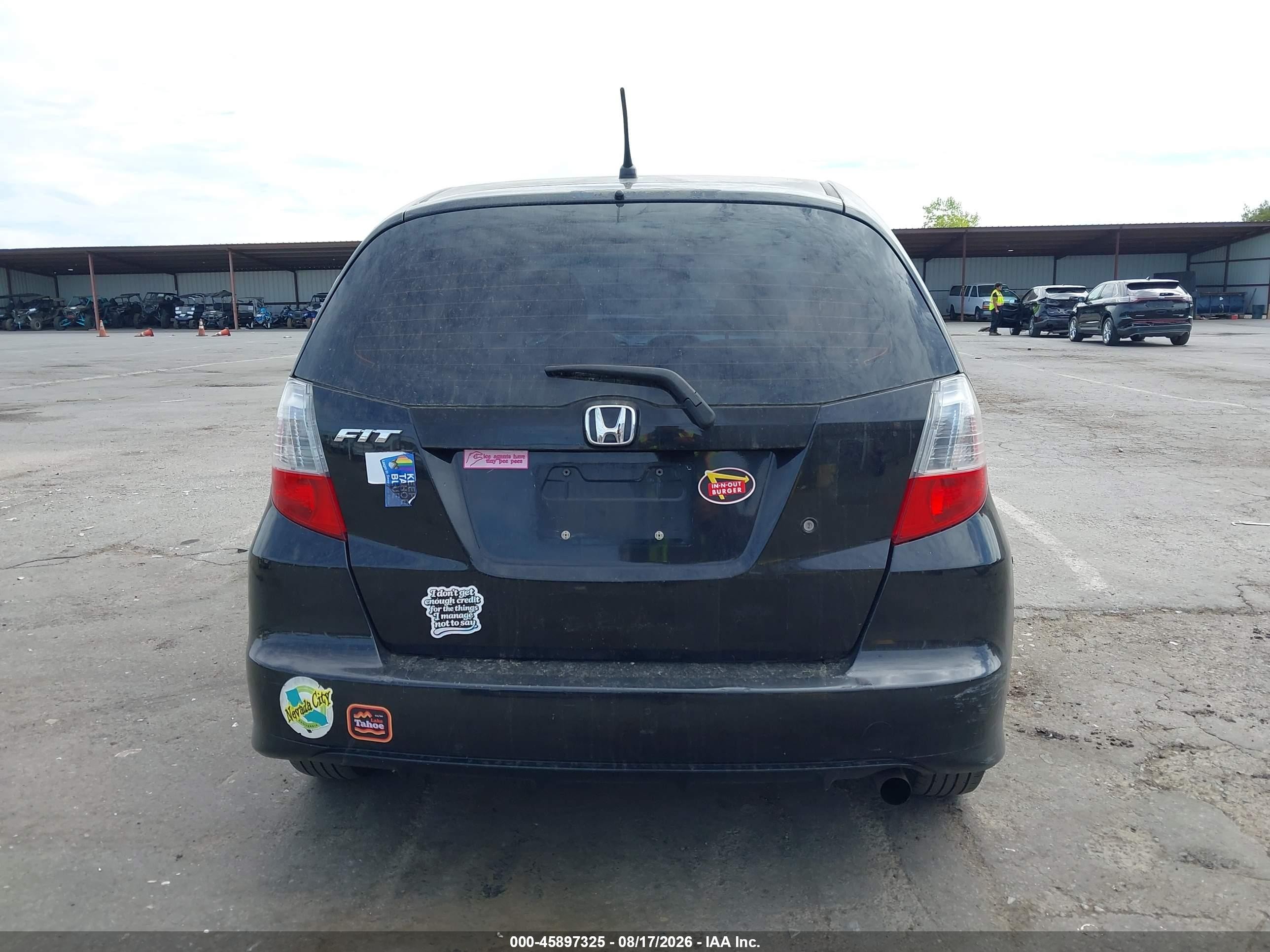 2009 Honda Fit   Black vin: JHMGE88249S058035