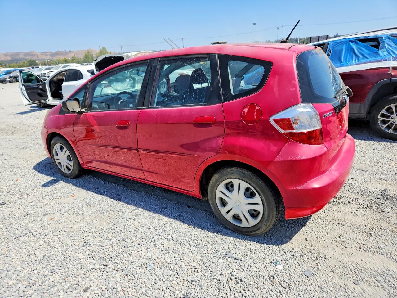 2009 Honda Fit Красный vin: JHMGE88259C004334