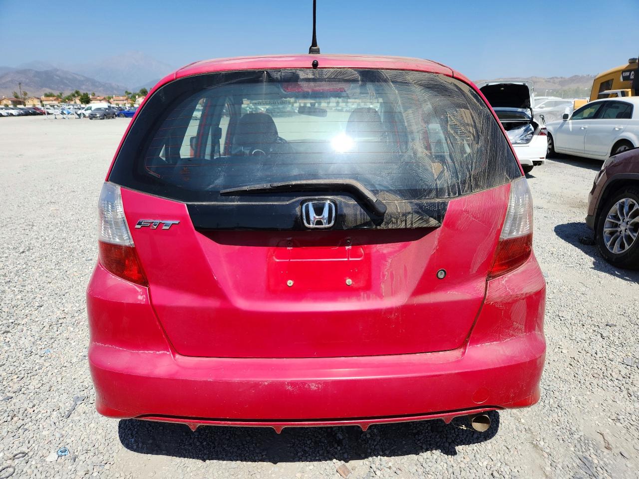 2009 Honda Fit Красный vin: JHMGE88259C004334