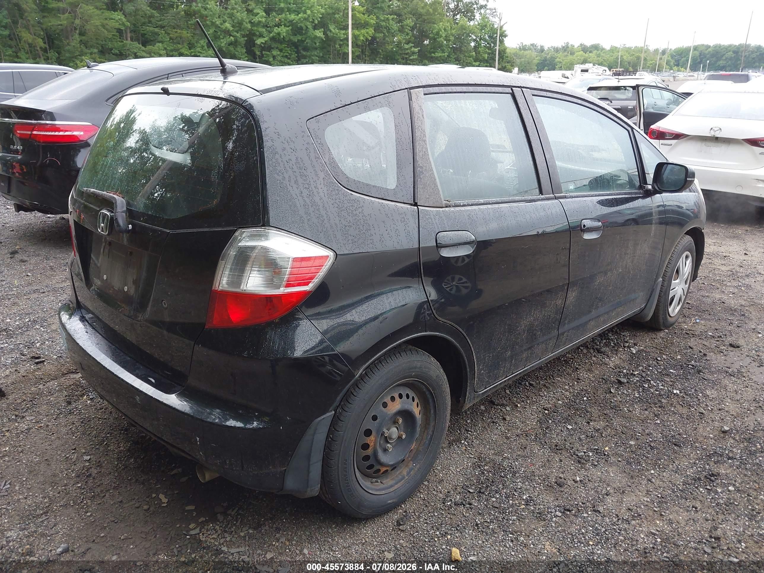 2009 Honda Fit   Black vin: JHMGE88259S028302
