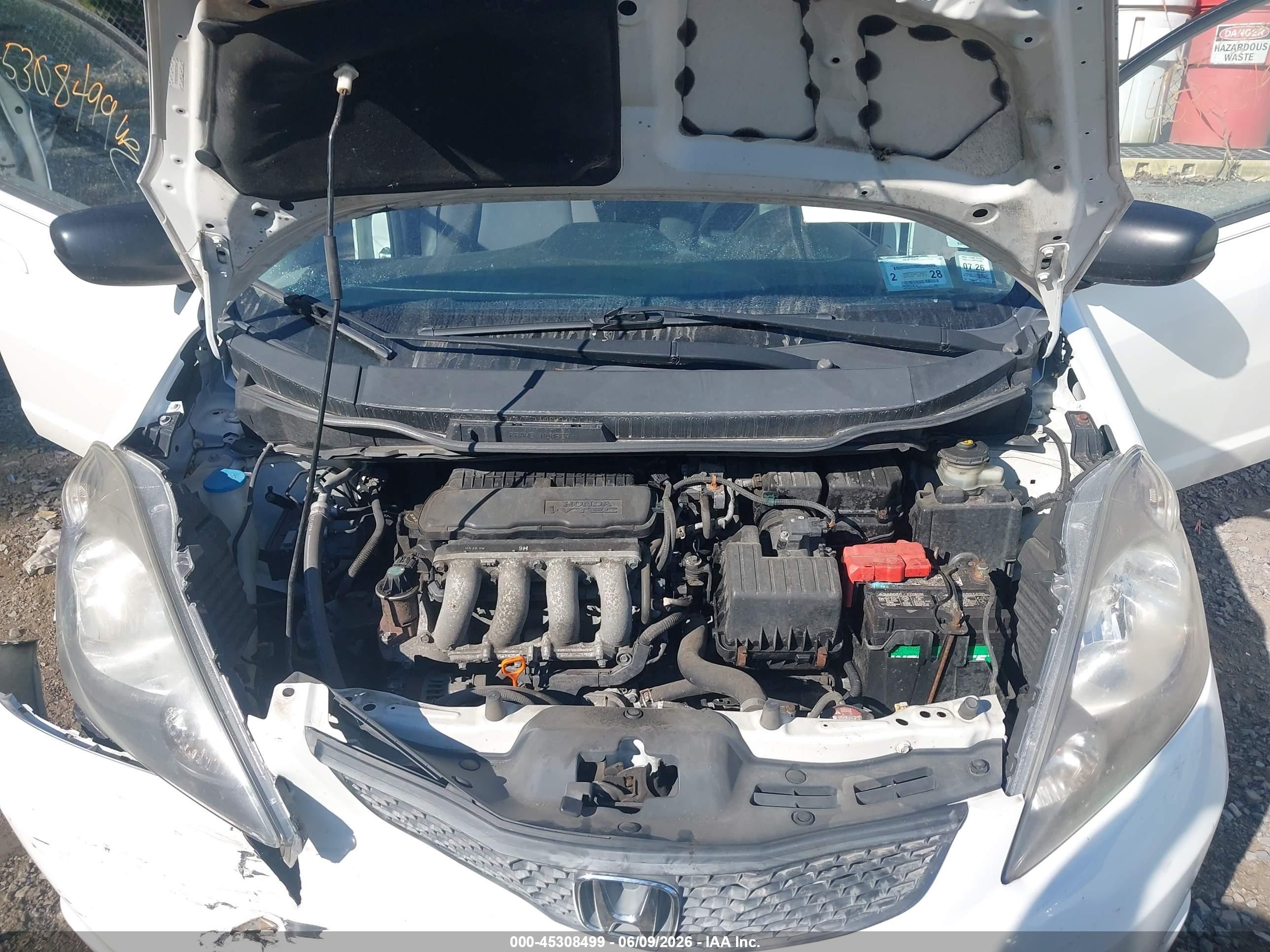 2009 Honda Fit   White vin: JHMGE88259S038022