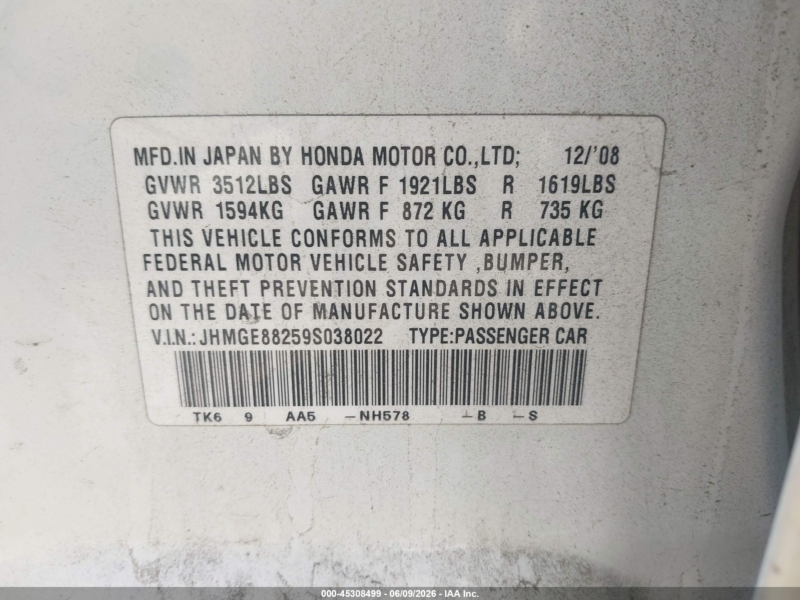 2009 Honda Fit   White vin: JHMGE88259S038022