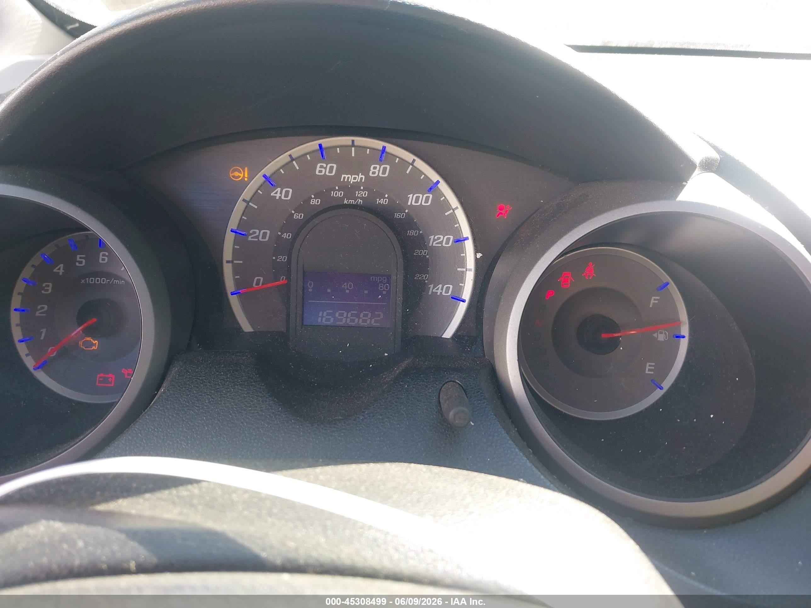 2009 Honda Fit   White vin: JHMGE88259S038022