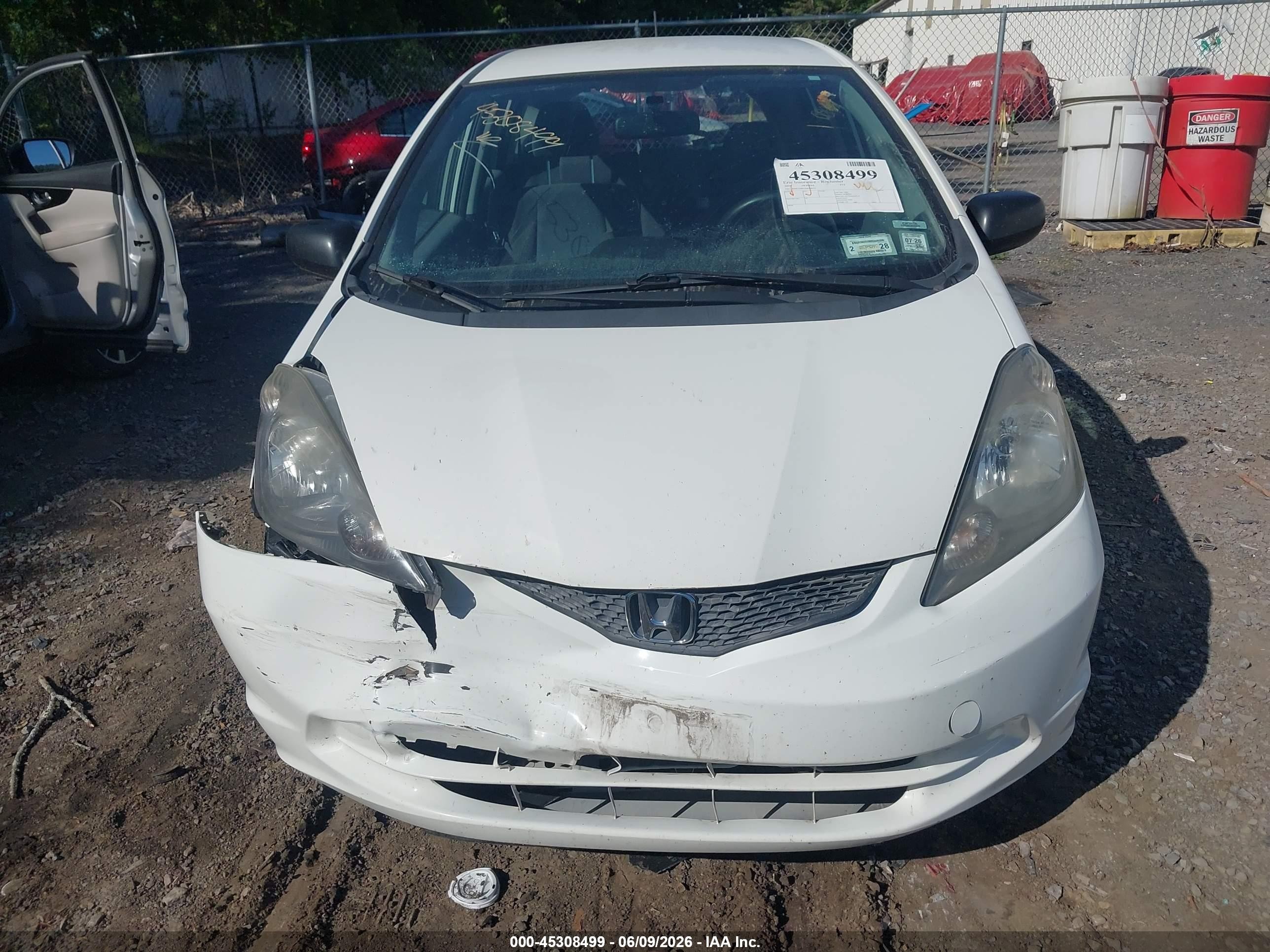 2009 Honda Fit   White vin: JHMGE88259S038022