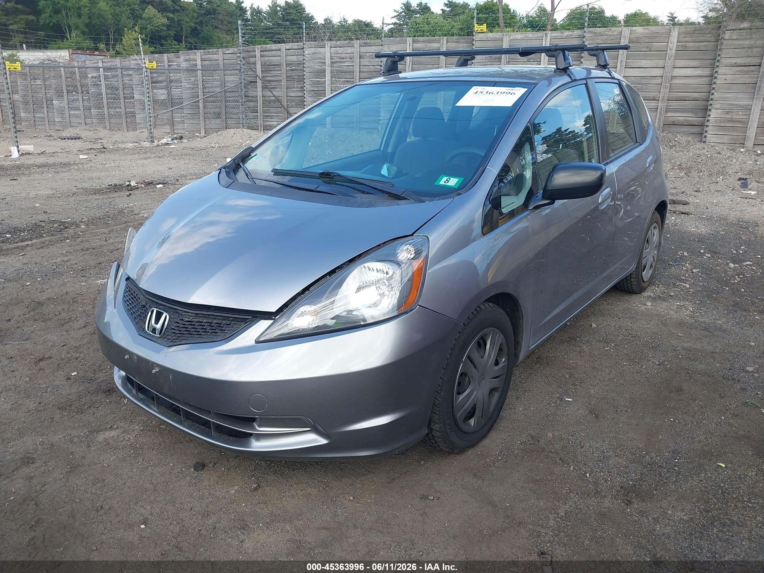 2009 Honda Fit   Silver vin: JHMGE88259S074454