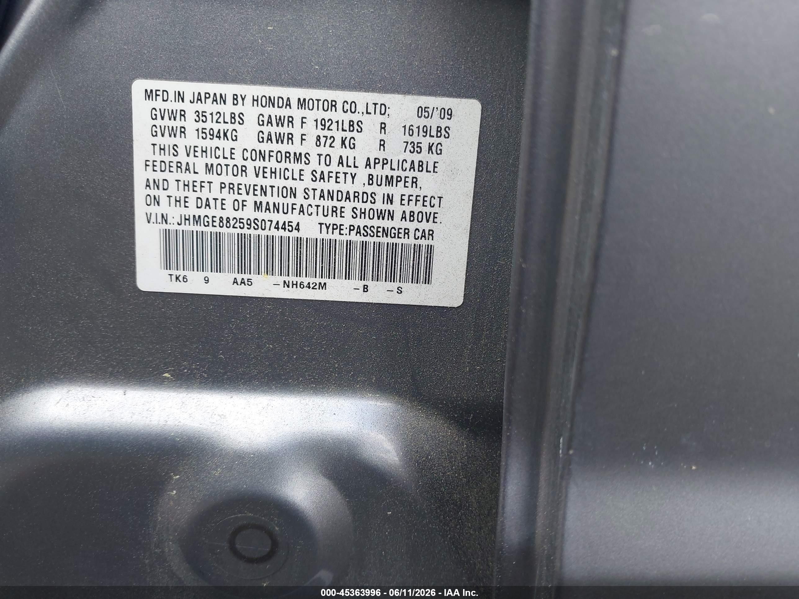 2009 Honda Fit   Silver vin: JHMGE88259S074454