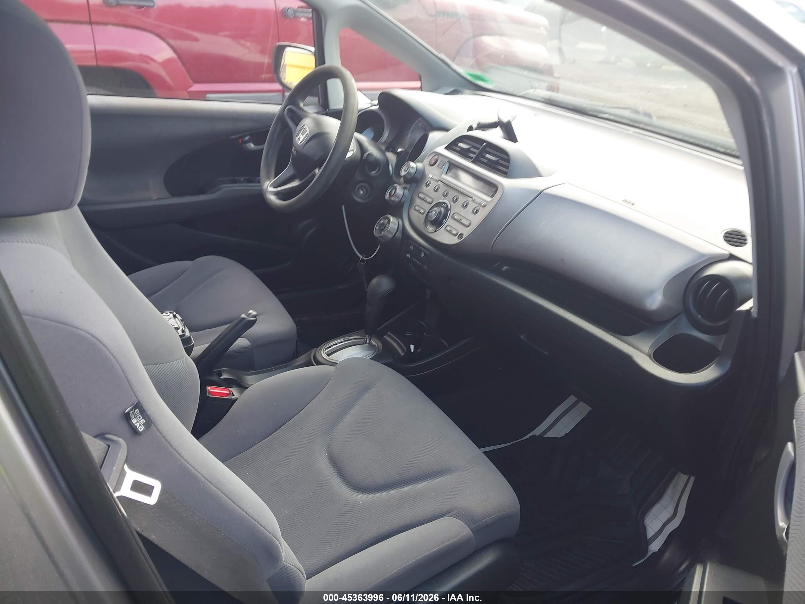 2009 Honda Fit   Silver vin: JHMGE88259S074454