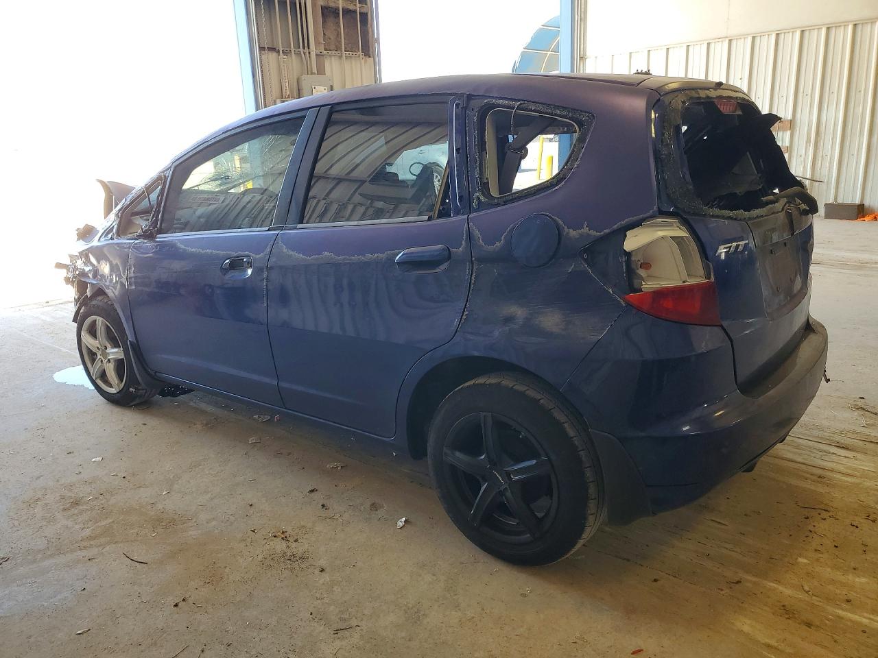 2009 Honda Fit Blue vin: JHMGE88269S058702