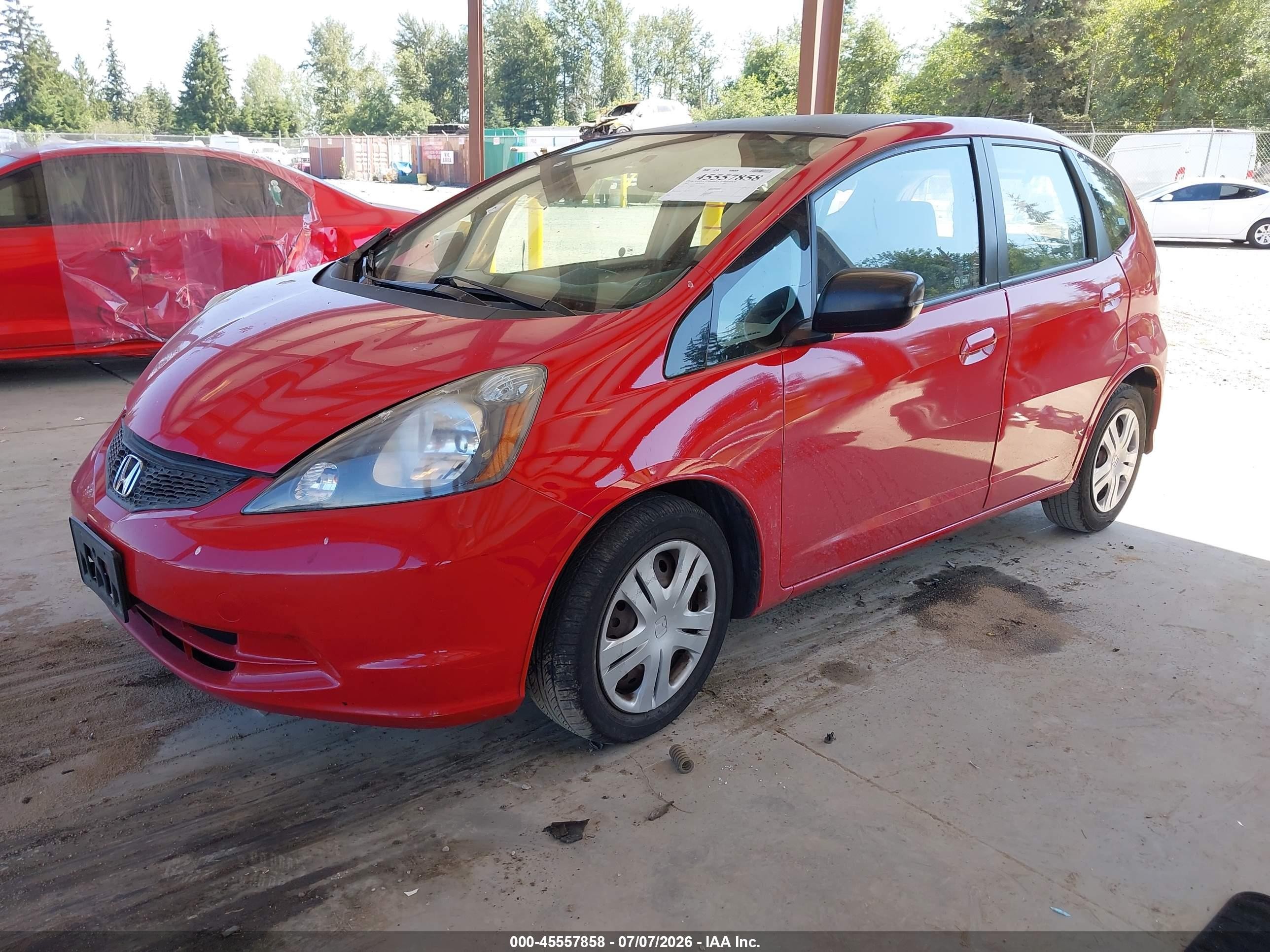 2009 Honda Fit   Red vin: JHMGE88279S072611